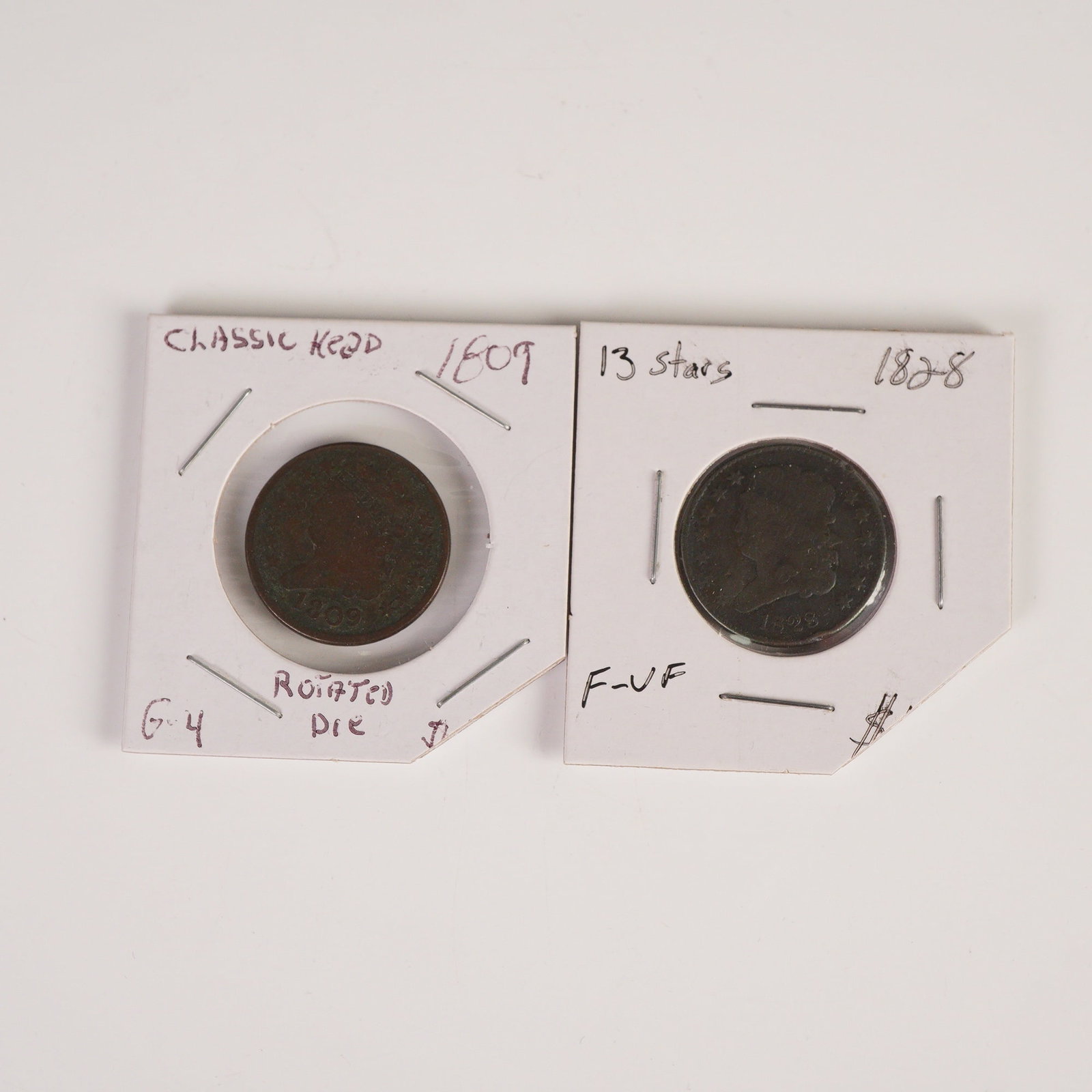 2pc 1809 to 1828 Classic Head Half Cent Coins: Each struck in copper, the 1809 example features the Classic Head portrait on the obverse with the inscription LIBERTY and a wreath on the reverse surrounding the text HALF CENT and UNITED STATES OF A