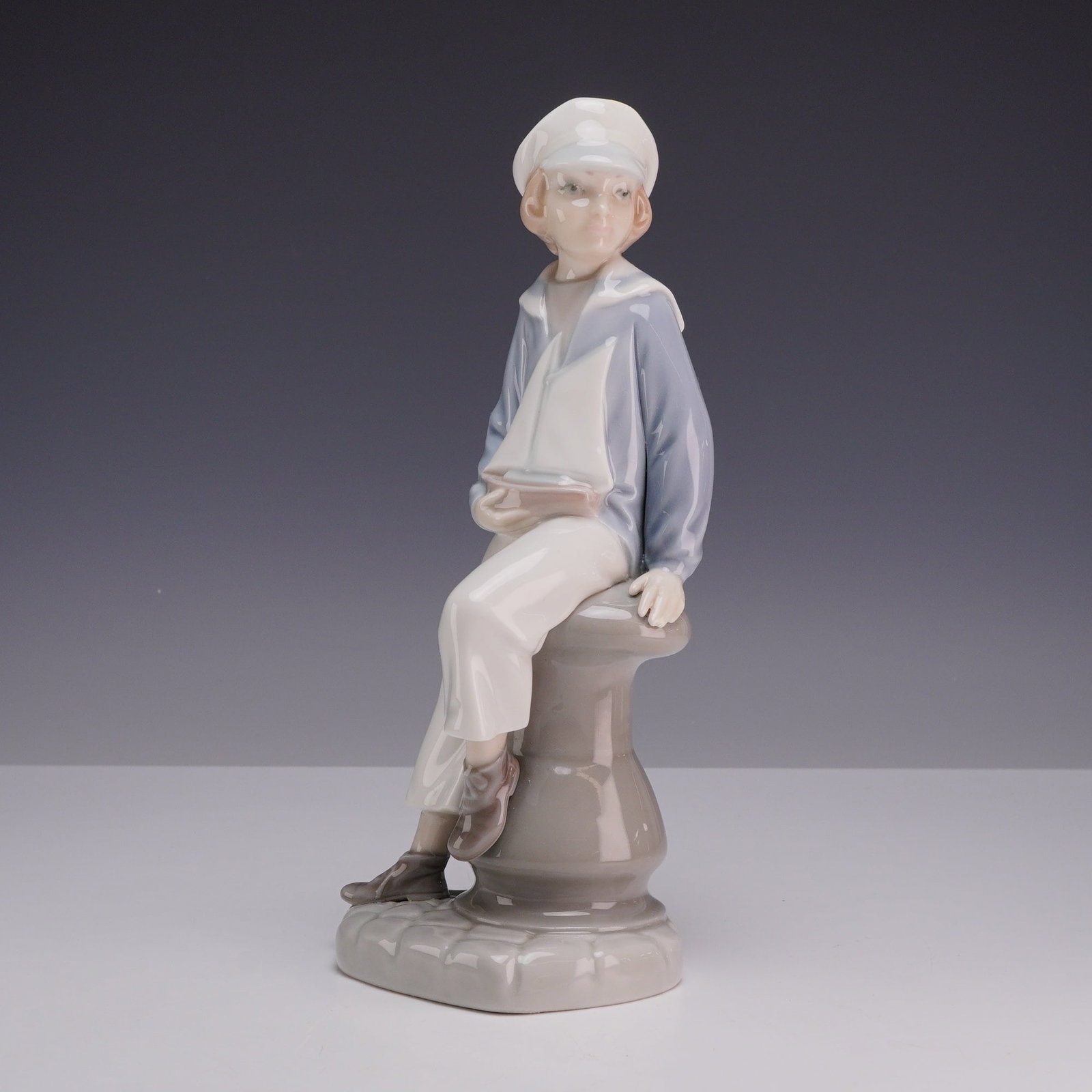 Lladro Glazed Porcelain Figurine Boy with Yacht 01004810 (1 of 3)