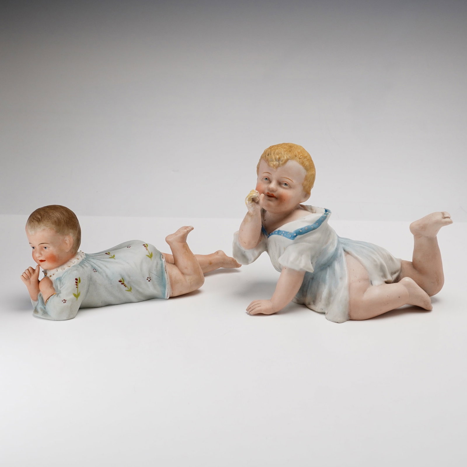 Two German Style Hand Painted Bisque Porcelain Piano Babies (1 of 3)
