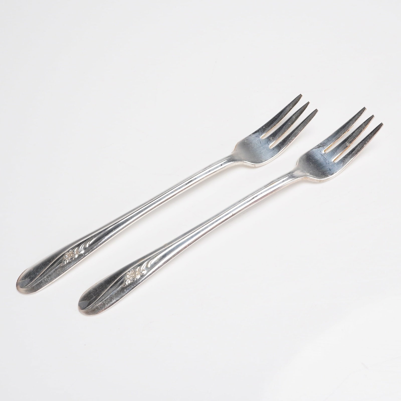 A Pair of Holmes & Tuttle Silverplate Meadow Flower Pattern Forks (1 of 4)