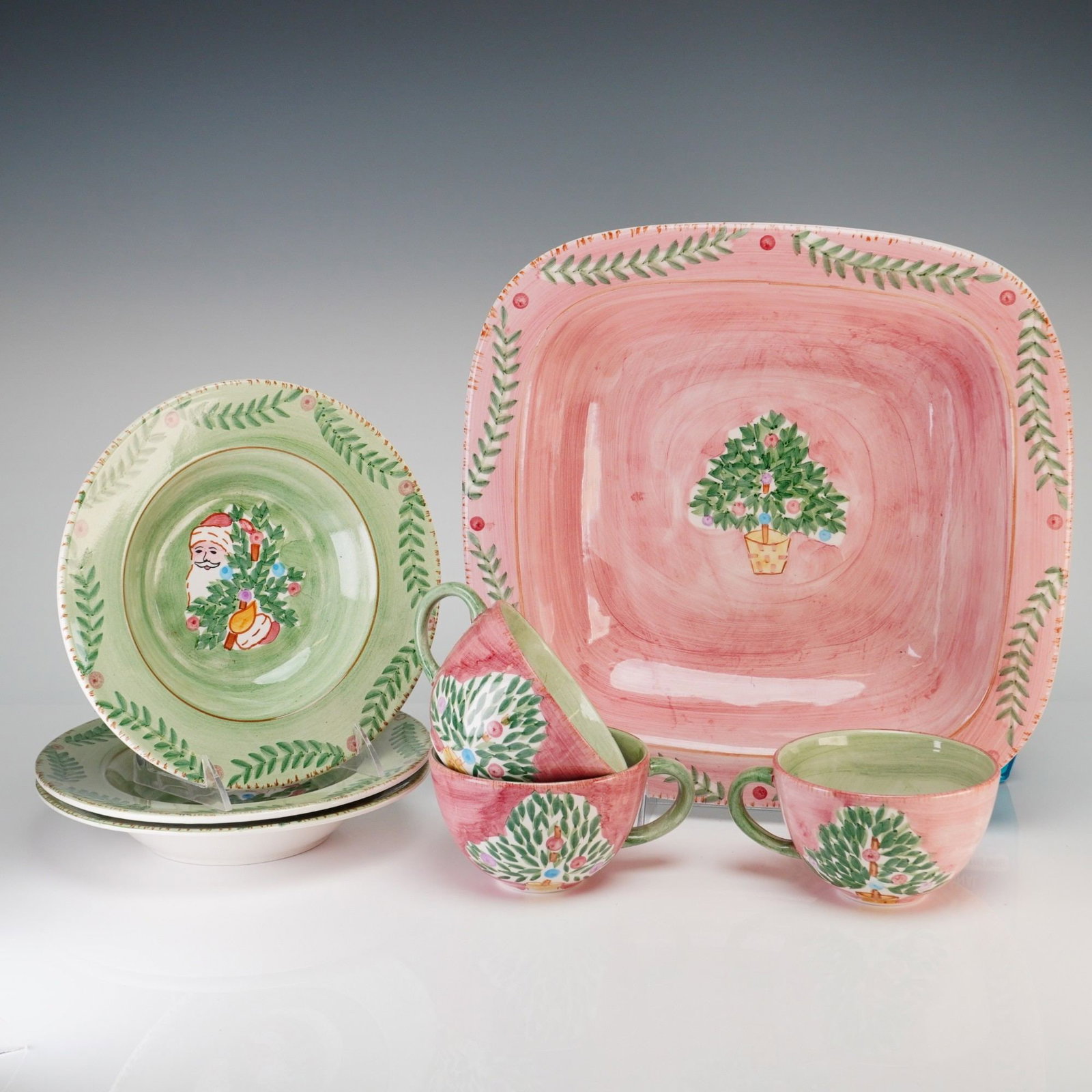 Seven Piece Set of Bella Ceramica Hand Painted Holiday Themed Earthenware: This seven piece set of holiday themed dishware is produced by the brand Bella Ceramica. The collection is constructed of glazed earthenware and features a hand brushed decorative style. The set