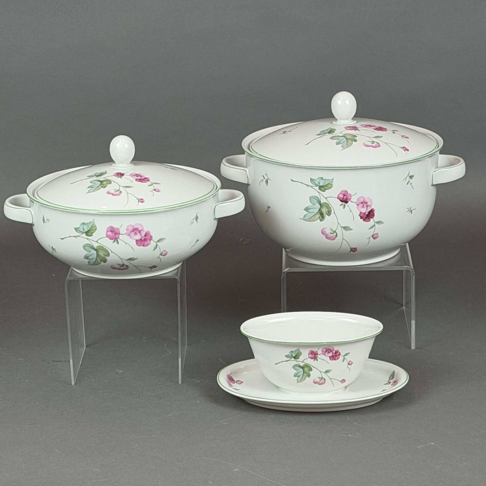 3pc Hutschenreuther Bavaria Porcelain Serving Set with Lids: This set of five Hutschenreuther Bavaria porcelain serving pieces includes two covered serving bowls and a gravy boat. The items are decorated in the Lukt?rt pattern, which features vibrant sprays of 