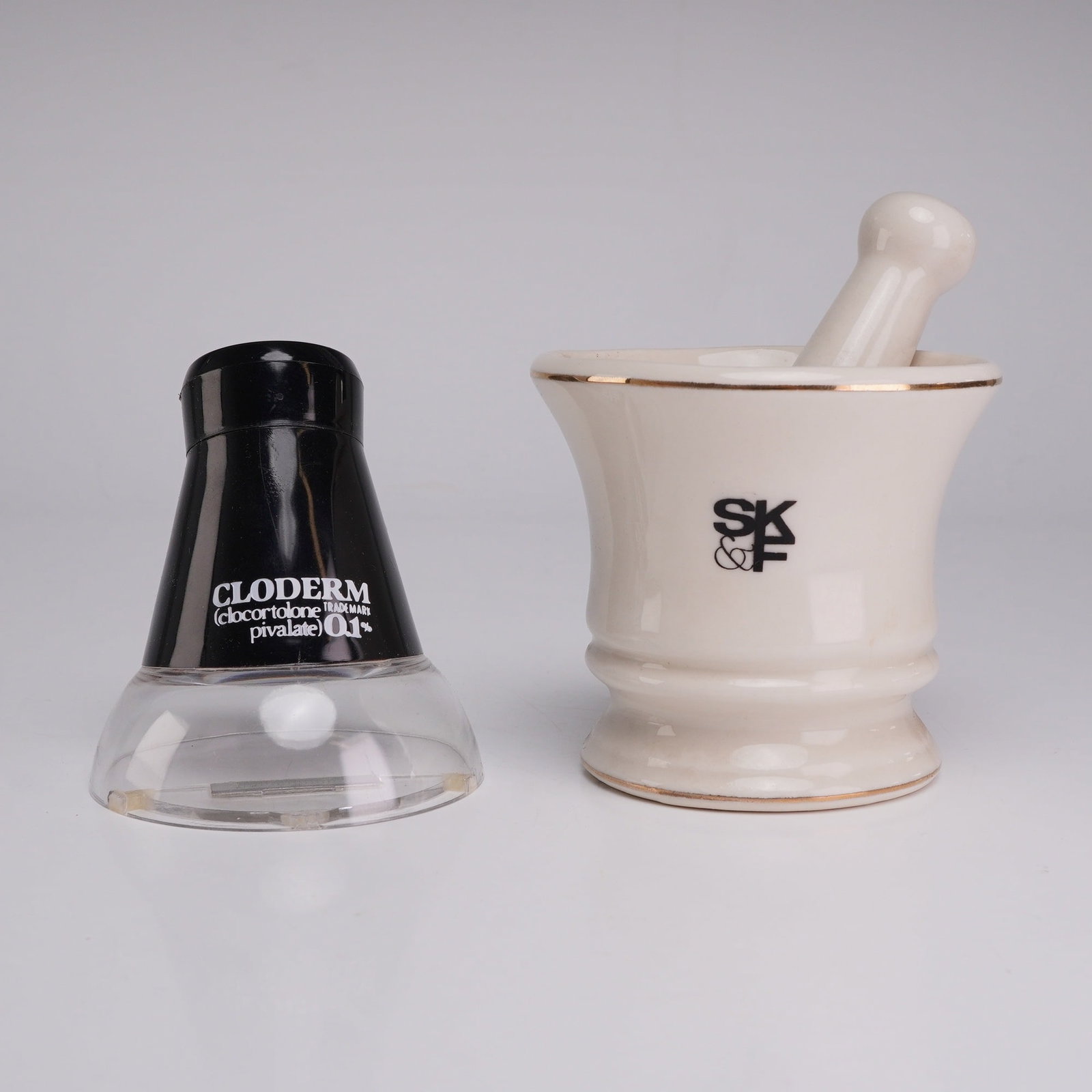 Two Medical Advertising Items- Griffith Pottery SK&F Mortar and Pestle and a Cloderm Magnifier (1 of 4)