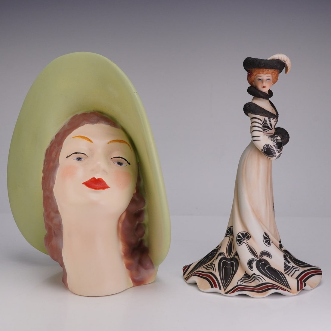 2pc Lady Figurines Including Lenox Tea At The Ritz & Vintage Ceramic Head Wall Pocket: This lot features two decorative lady figurines. The first is a fine porcelain sculpture from the Lenox Collections titled Tea At The Ritz. The figure is depicted in early 20th-century attire, wearing