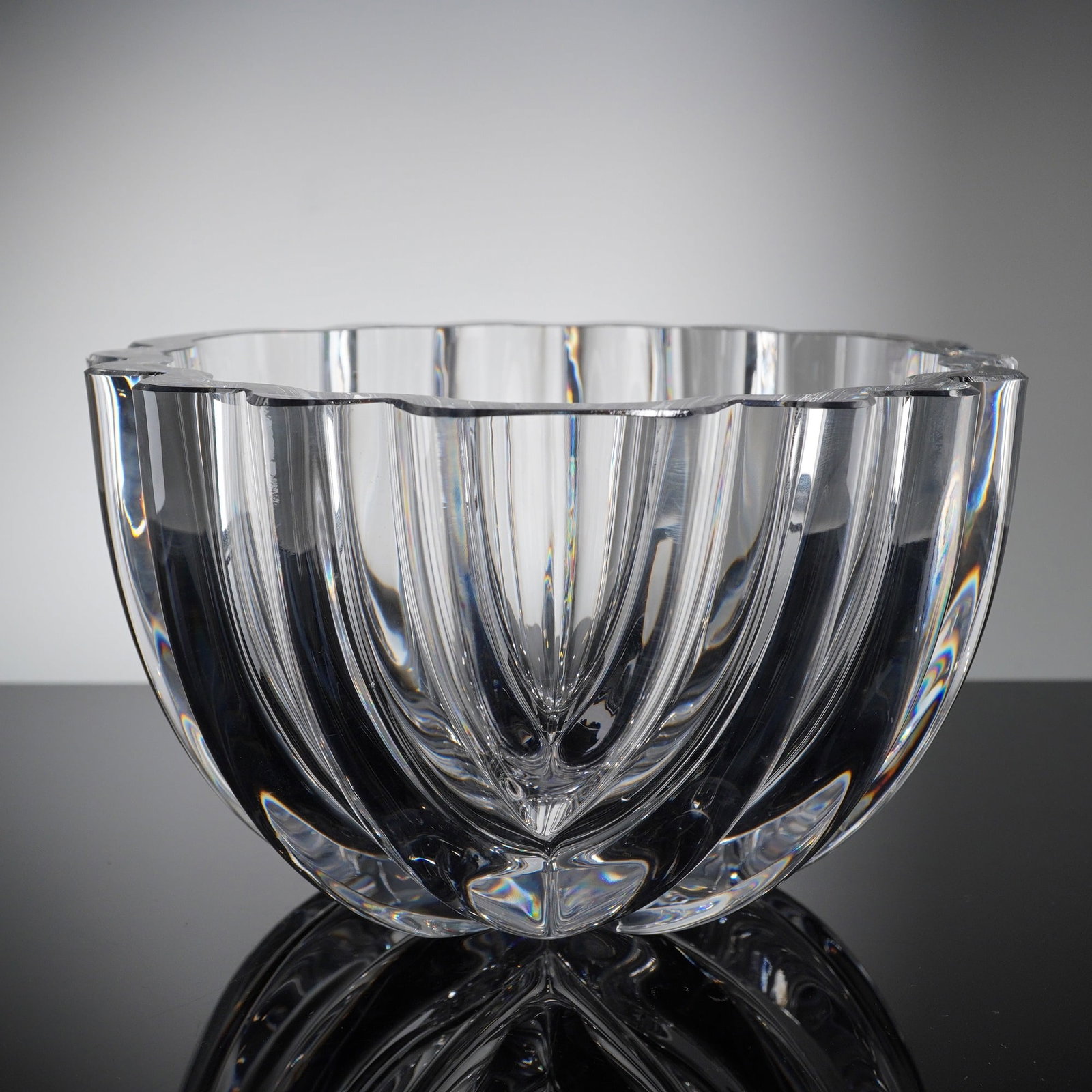 Orrefors Crystal Art Glass Bowl: A single piece of heavy art glass or crystalware produced by Orrefors of Sweden, likely dating to the Modern or Mid-Century period. The piece functions as a bowl or centerpiece, characterized by thick