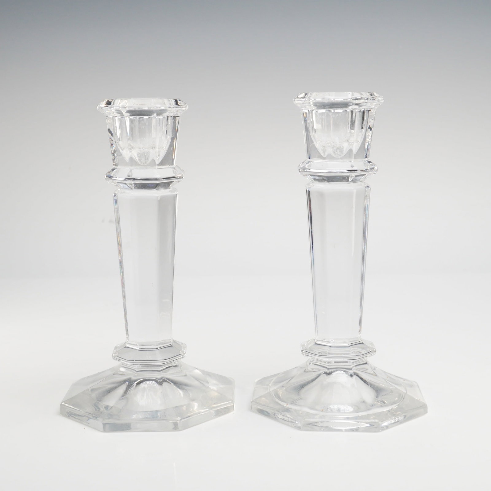 Mikasa Cambridge Pattern Pair of Crystal Candle Holders: This is a matching pair of crystal candle holders featuring the sophisticated "Cambridge" pattern, attributed to Mikasa. Each piece is crafted from high-quality lead crystal, evidenced by exceptional 