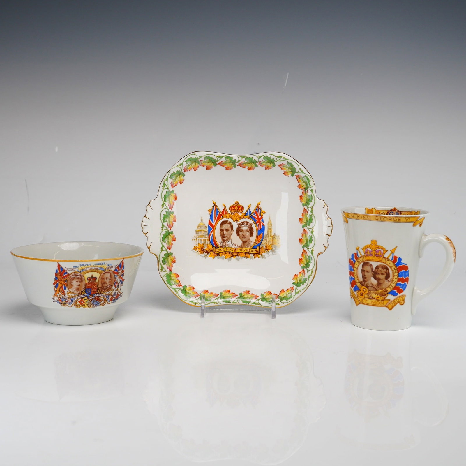 3pc British Royal Commemorative Ceramic Ware Including a Shelley King George VI Coronation Mug: This lot features a bone china coronation mug manufactured by Shelley and a white ceramic bowl commemorating the Silver Jubilee of King George V. The Shelley mug commemorates the May 1937 coronation o