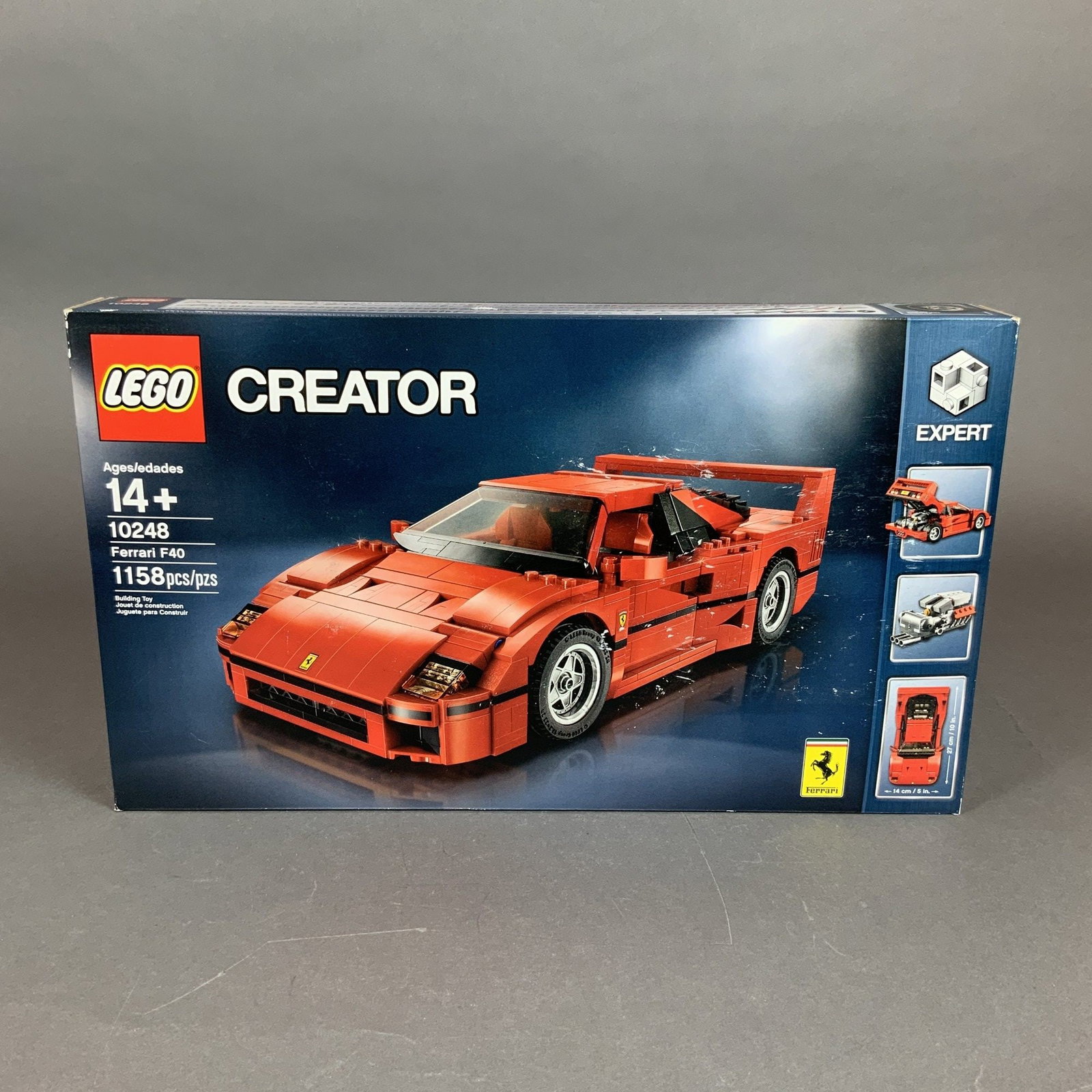 LEGO Creator Expert Ferrari F40 Set: This LEGO Creator Expert construction set depicts the Ferrari F40 supercar, identified as model number 10248. The set consists of 1,158 molded plastic pieces and is recommended for ages 14 and up. As 