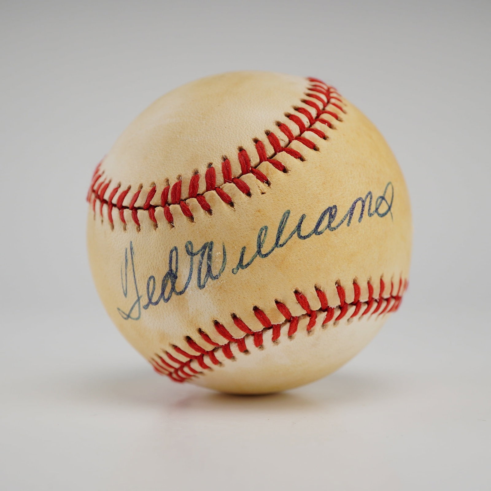 Ted Williams Autographed Rawlings Official American League Baseball with PSA/DNA LOA: This lot features a Rawlings Official American League Baseball signed by Boston Red Sox legend and Hall of Famer Ted Williams. The baseball is a Lee MacPhail era model, produced between 1974 and 1983.