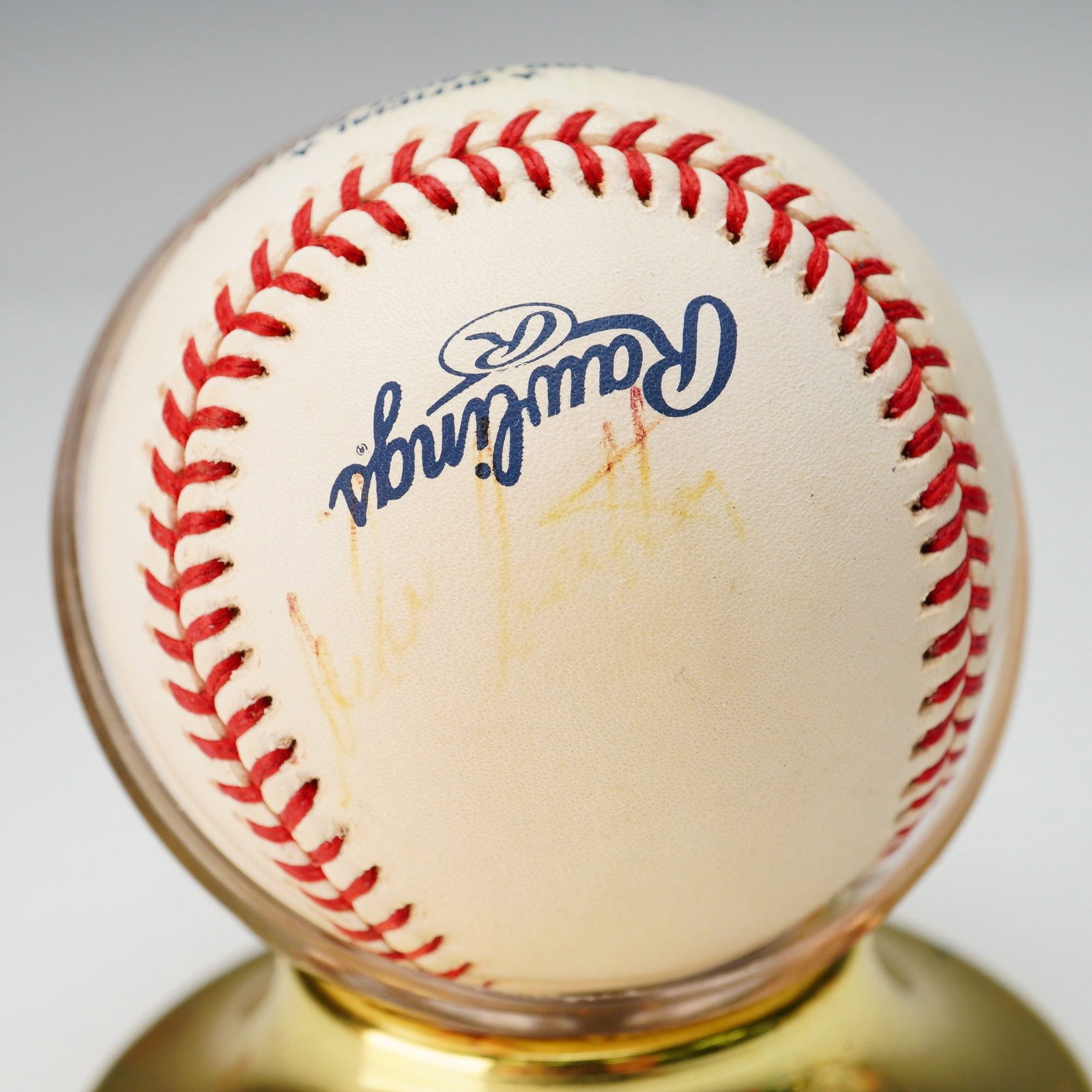 Mike Matheny Signed MLB Baseball: Featured is an official Rawlings Major League Baseball bearing the autograph of Mike Matheny, a former MLB catcher and award winning manager. The signature, penned in faint golden ink, is subtly inscr