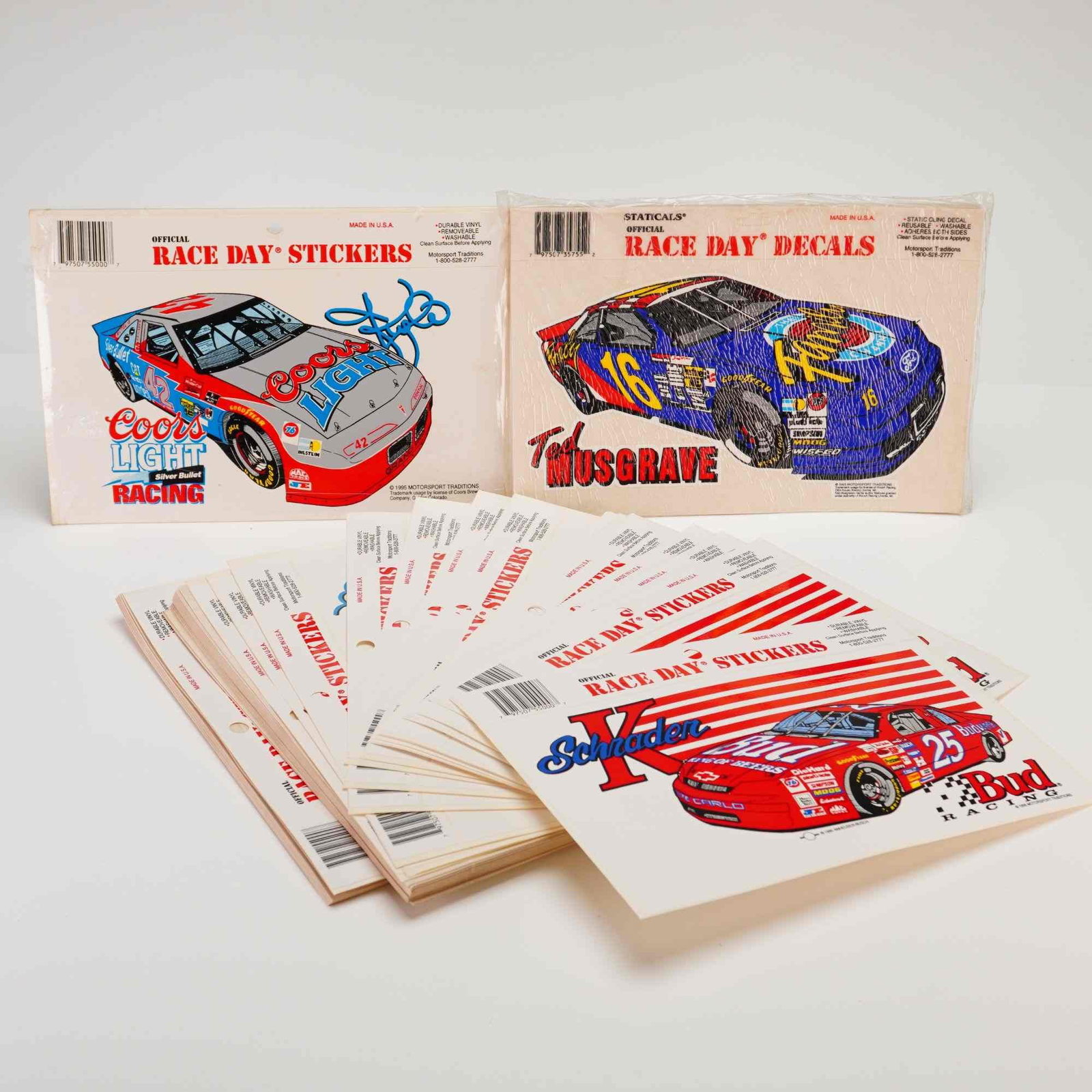 Collection of Vintage Motorsport Traditions NASCAR Official Race Day Decals and Stickers Stack: A collection of NASCAR Official Race Day Stickers and Staticals Official Race Day Decals produced by Motorsport Traditions, dated 1995. This assortment includes multiple adhesive vinyl sticker sheets