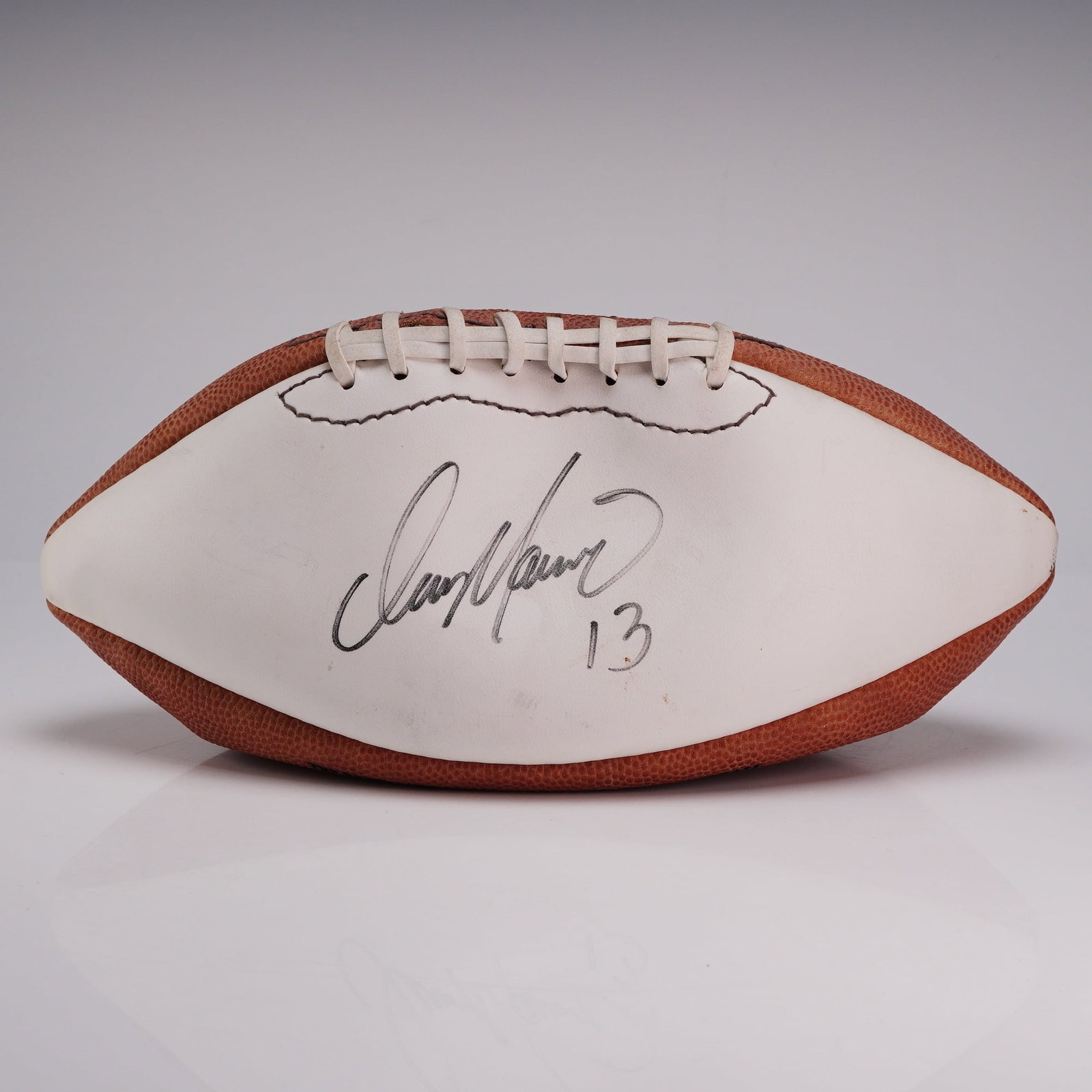 Wilson NFL The Robby Official Autograph Football Signed by Dan Marino: Wilson The Robby Official NFL Autograph Football hand-signed by Hall of Fame quarterback Dan Marino. The football is constructed with two brown pebbled panels and two smooth white panels designed for