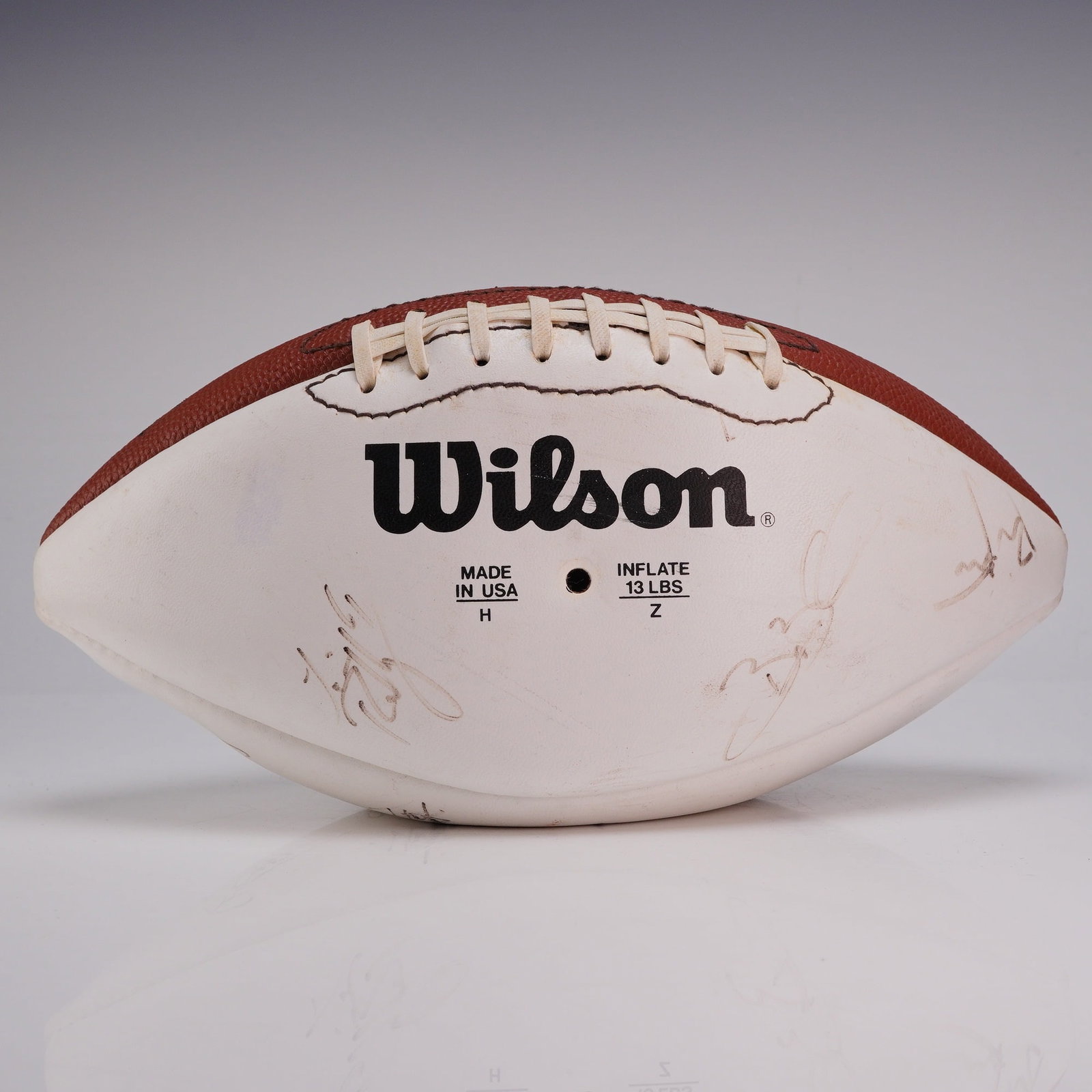 Wilson XXIX Super Bowl Signed Football Featuring Miami Dolphins Alumni Signatures: This is a Wilson commemorative NFL football produced for Super Bowl XXIX, which took place on January 29, 1995. The ball is constructed with one traditional brown pebble-grain leather panel and three