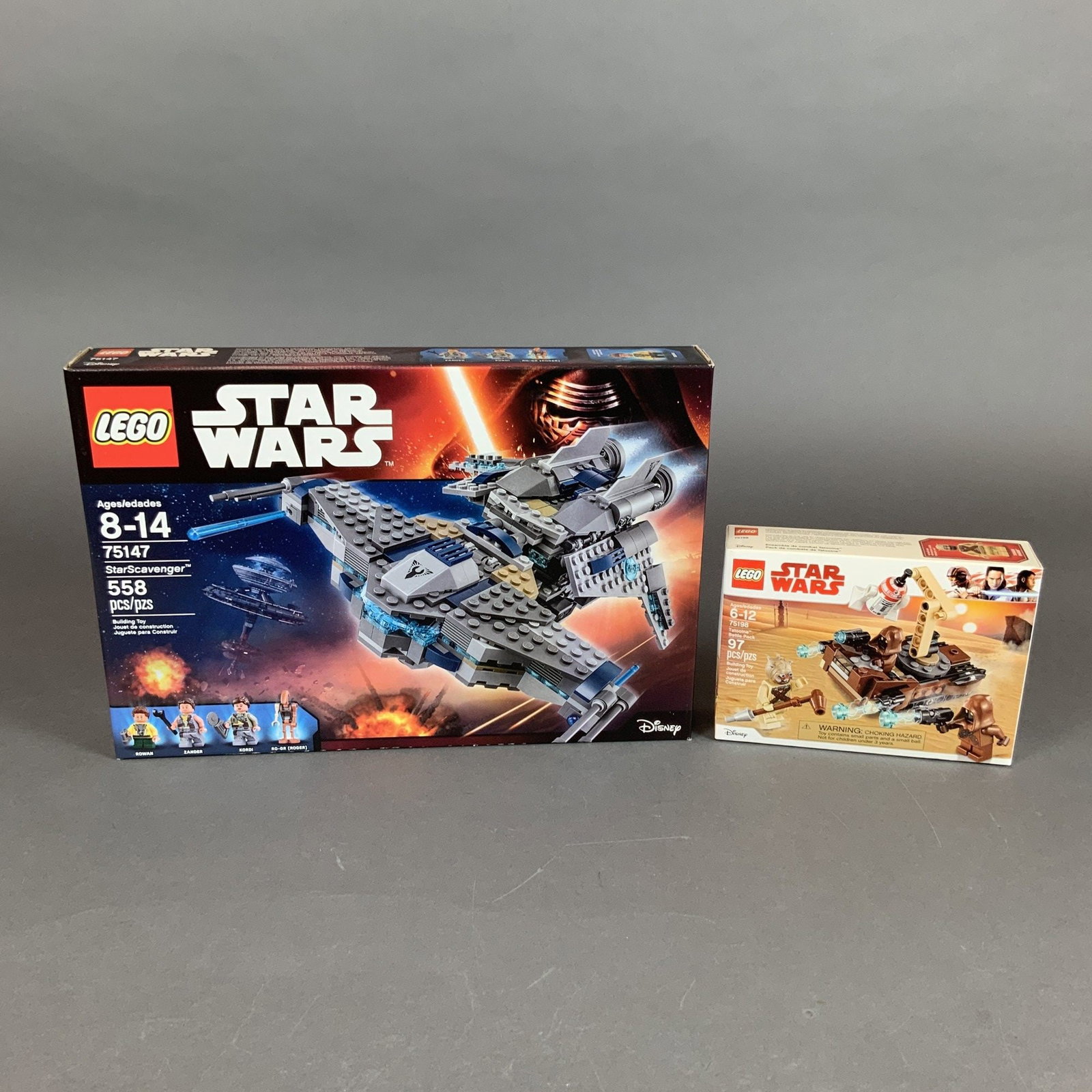 Two LEGO Star Wars Building Sets 75147 StarScavenger and 75198 Tatooine Battle Pack: This lot consists of two original LEGO Star Wars building sets in their original packaging. The first set is LEGO 75147 StarScavenger, part of the Star Wars: The Freemaker Adventures series. This set 