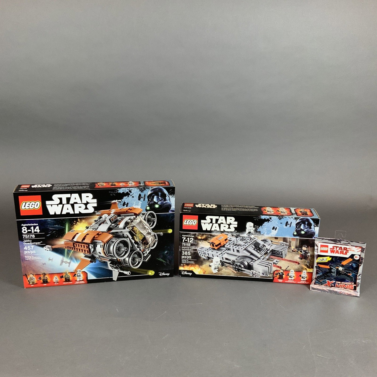 Three LEGO Star Wars Building Sets Including 75152, 75178, and Poe Dameron's X-wing: A collection of three factory-sealed LEGO Star Wars building sets manufactured by The LEGO Group. This collection includes set 75178, the Jakku Quadjumper, which features 457 pieces and minifigures of