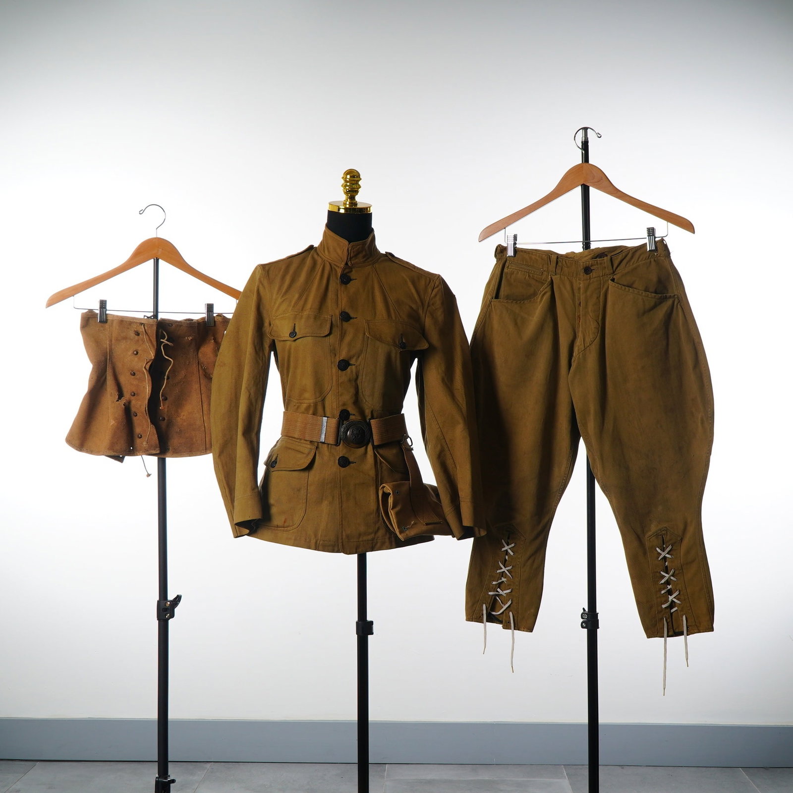 3pc Authentic US Army WWI Khaki Cotton Service Uniform: This group consists of a J. A. Hirsch & Co. special order department US Army M1912 pattern khaki cotton service uniform, a style utilized as a summer or tropical field uniform during World War I. The 