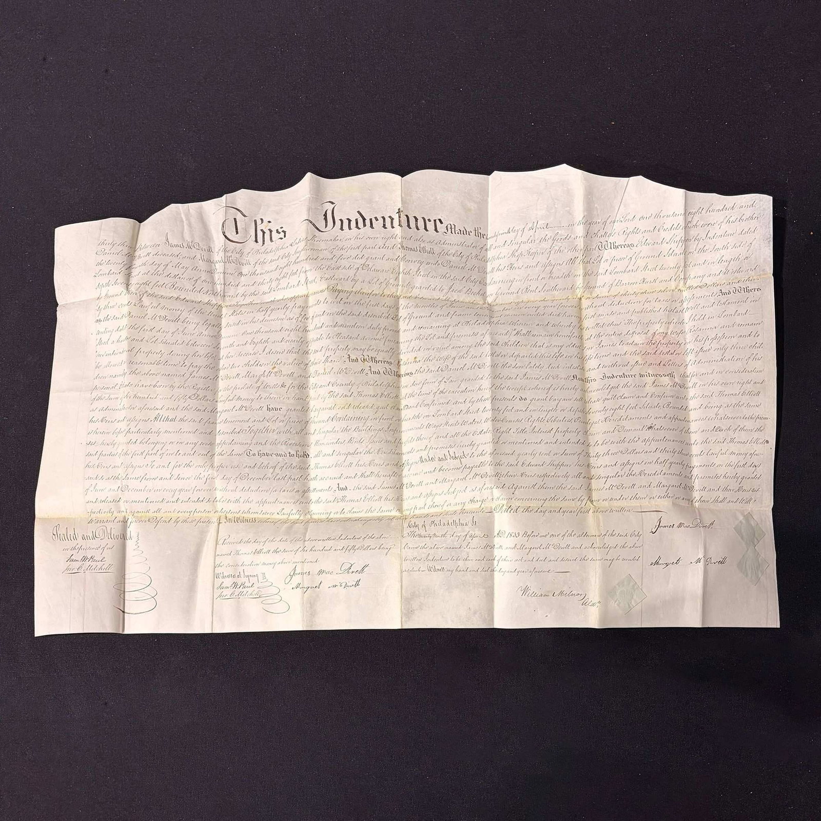 McDevitt, James and Margaret. Philadelphia Real Estate Indenture for Lombard Street. 1833. (Signed): James McDevitt and Margaret McDevitt. Manuscript Indenture for a Messuage and Lot on the South side of Lombard Street, Philadelphia. Philadelphia, Pennsylvania: April 29, 1833. This single-sheet manus