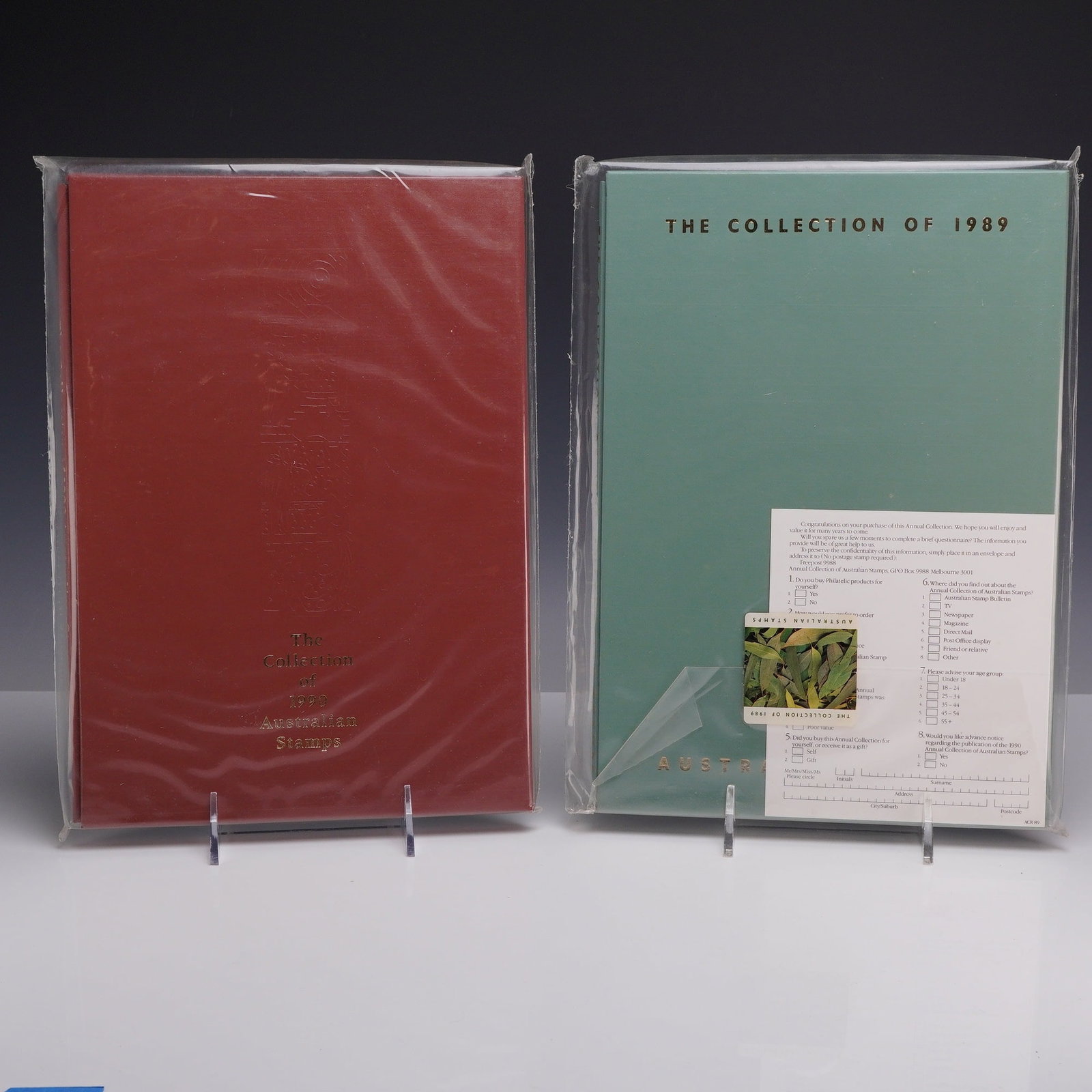 Two Sets AU 1989 and 1990 Australia Post Deluxe Annual Year Books, MNH: Two sets of official Australia Post deluxe annual stamp collection folders for the years 1989 and 1990. The 1989 collection is bound in a green textured cover titled The Collection of 1989 Australian 