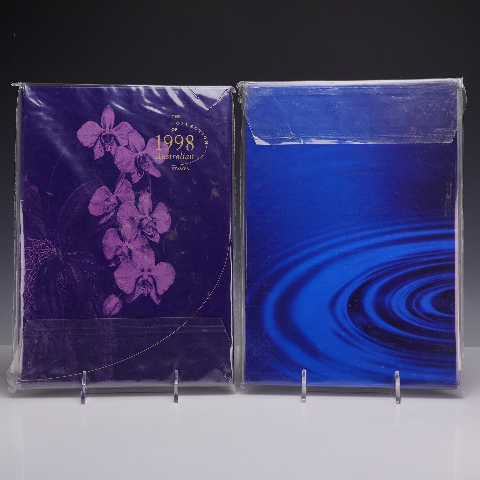 Two Australian 1997 and 1998 Post Deluxe Stamp Collection Yearbooks: A pair of Australia Post annual collection yearbooks, comprising the Deluxe Editions for 1997 and 1998. Both sets are presented as hardcover books with matching slipcases, preserved within their origi