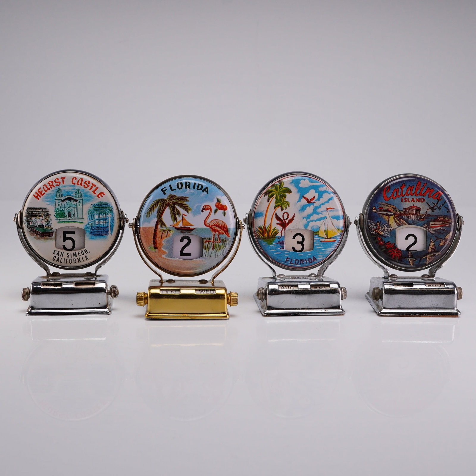 Set of Four Vintage Souvenir Perpetual Roll Top Desk Calendars (1 of 3)
