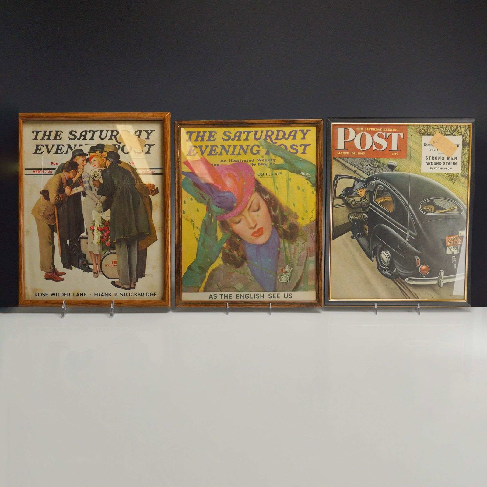 3pc The Saturday Evening Post Framed Issues, Curtis Publishing Company, 1936-1945: A trio of framed vintage periodicals consisting of three issues of The Saturday Evening Post published by the Curtis Publishing Company. The collection includes the issue from March 7, 1936 (Volume 20