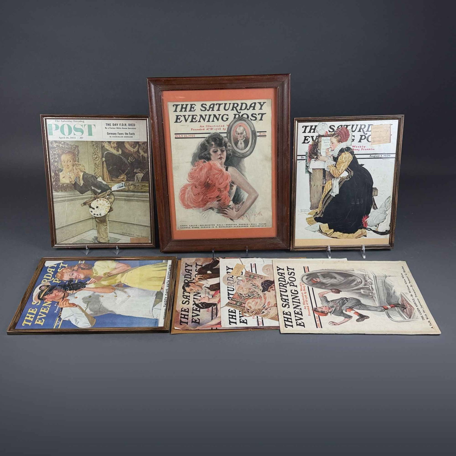 7pc The Saturday Evening Post Covers, Curtis Publishing Company, 1915-1955: This lot consists of a collection of The Saturday Evening Post magazines and cover illustrations, spanning the years 1915 to 1955. Published by the Curtis Publishing Company, these items are in the st