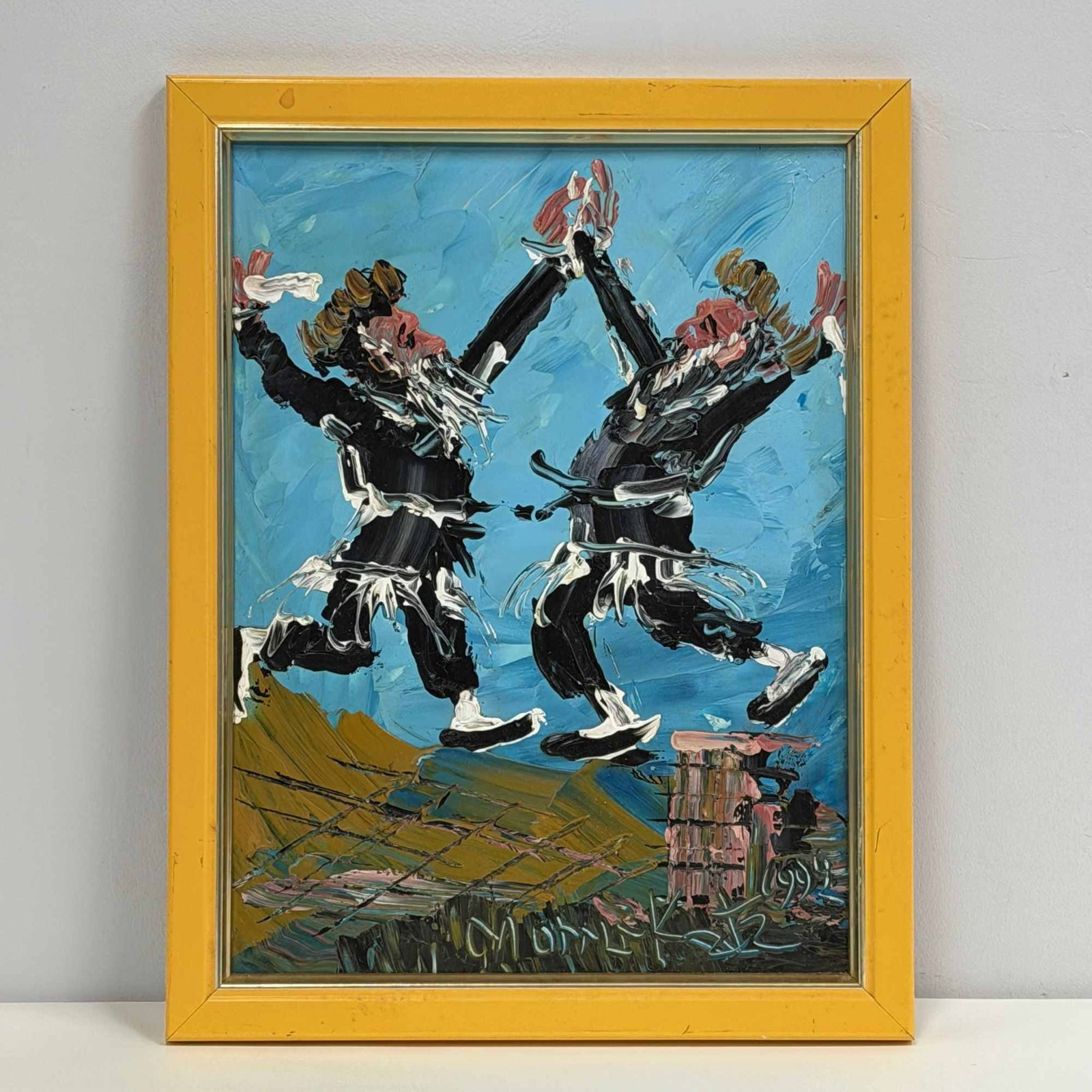 Morris Katz (Polish-American, 1932-2010) Framed Oil Painting on Board, Signed and Dated 1999: This original oil painting on board by Morris Katz (1932-2010) depicts two stylized figures in traditional attire engaged in a spirited dance. The work is executed in the artist's signature expression