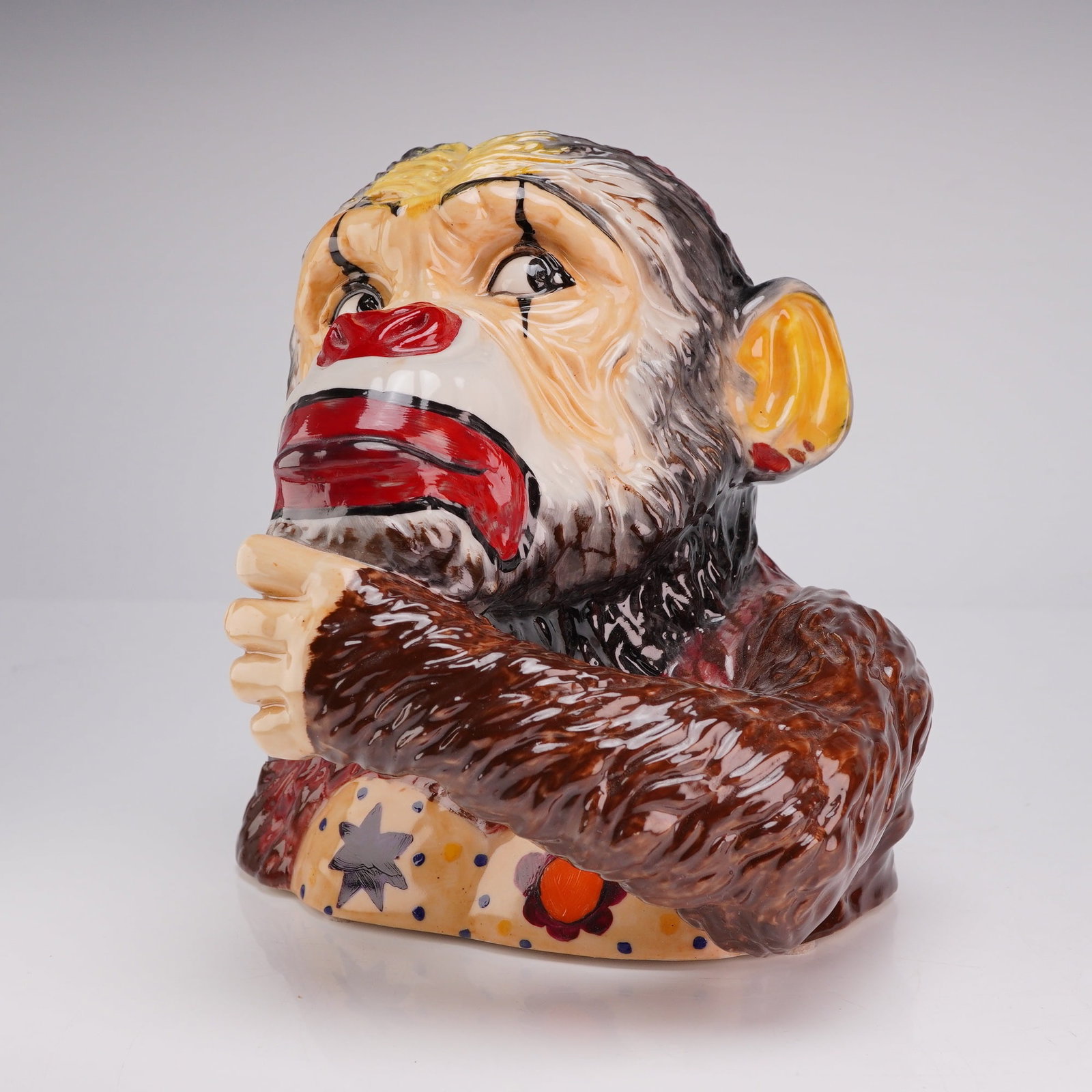 Kevin Francis Ceramics Banksy Street Art The Thinker Trial Bust by Victoria Bourne: This lot features a glazed ceramic character bust produced by Kevin Francis Ceramics as part of the Banksy Street Art collection. Titled The Thinker, the sculpture depicts a chimpanzee in a pensive po