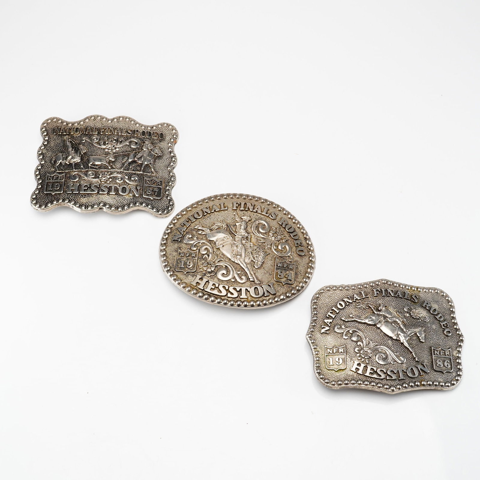 3pc Fred Fellows Limited Collectors Buckles Anniversary Series, National Finals Rodeo (1 of 3)