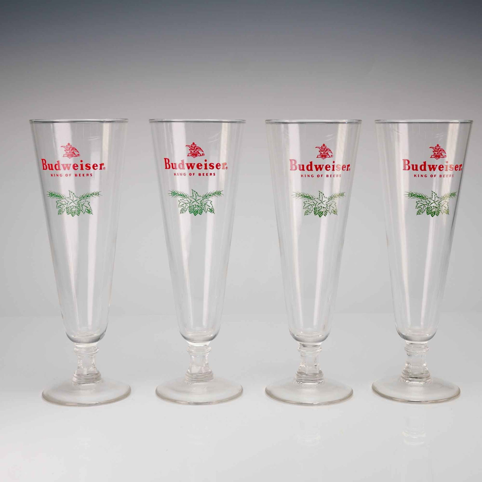 A Set of 4 Vintage Budweiser Christmas Footed Pilsner Beer Glasses (1 of 4)