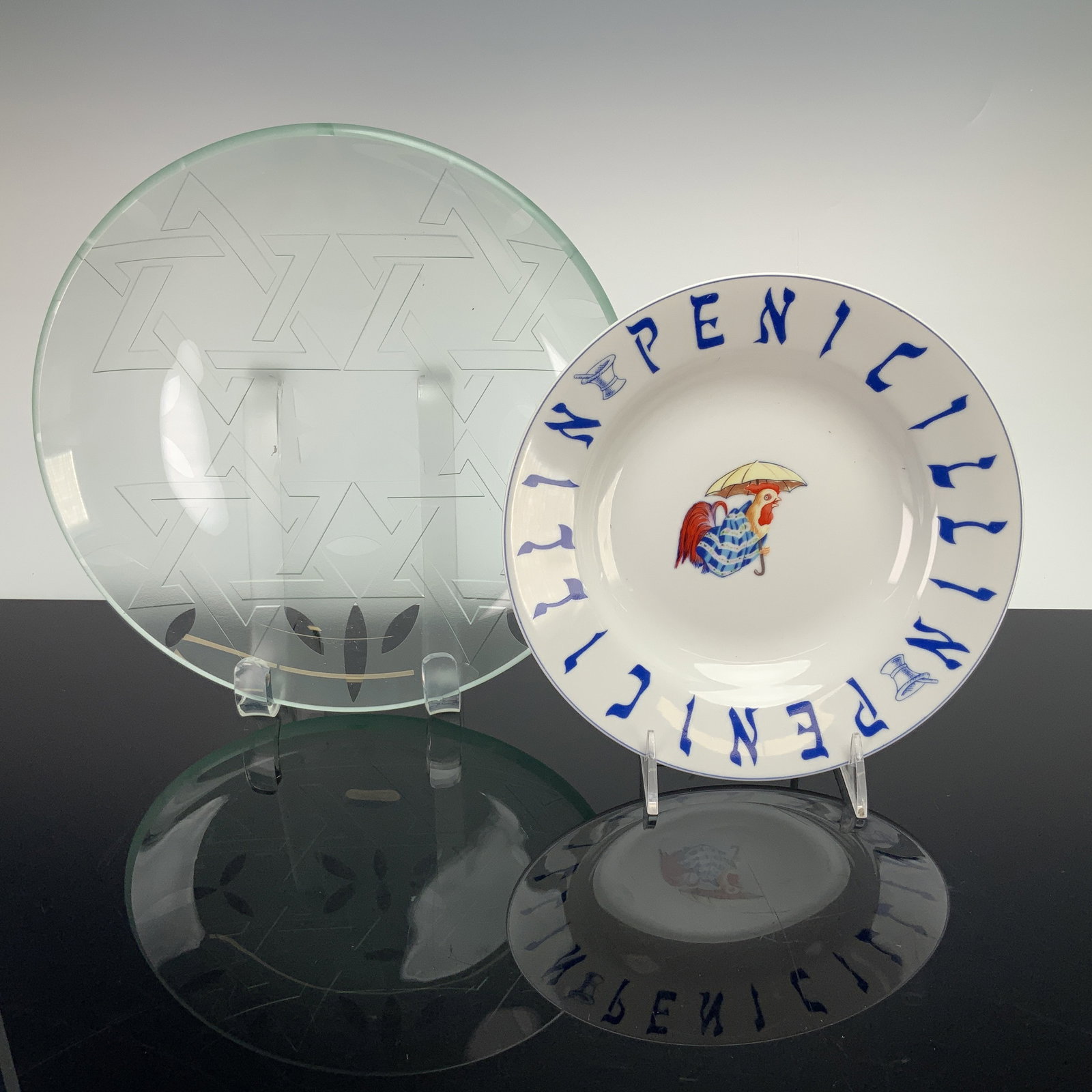 2pc Judaica Grouping Including Sigma The Tastesetter Jewish Penicillin Soup Bowl and Glass Star of: This lot consists of a Judaica shallow bowl and glass platter grouping. The bowl is constructed of white glazed ceramic and features a wide, flat rim. The central well is decorated with a multi-color 