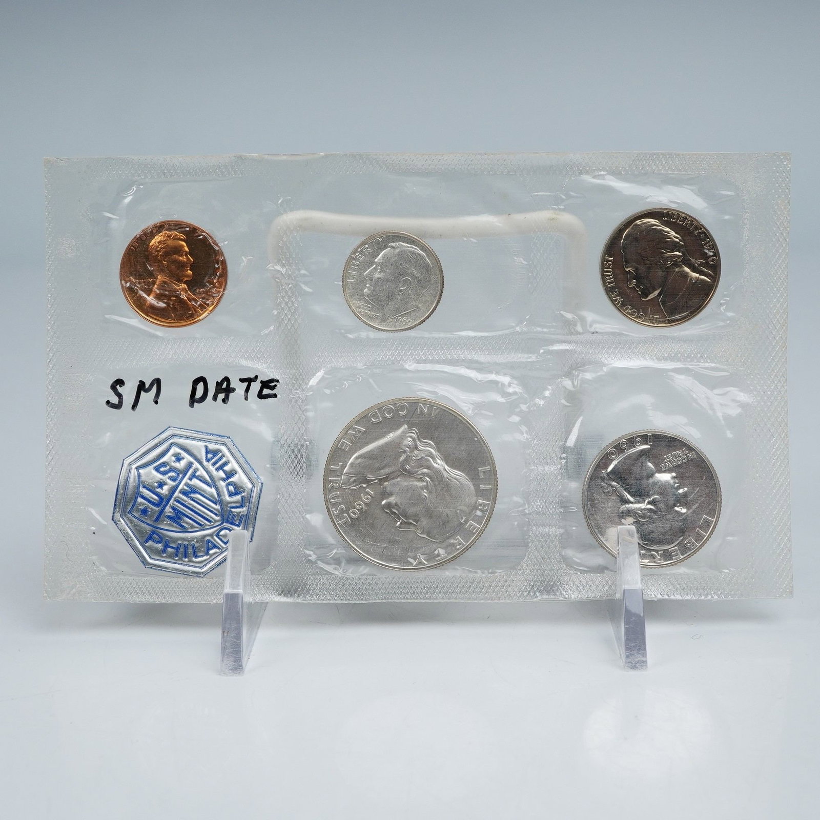 1960-P Set of 5 Coins & Mint Token: The set includes a Lincoln Cent (copper), Jefferson Nickel (copper-nickel), Roosevelt Dime (90% silver, 2.5 g), Washington Quarter (90% silver, 6.25 g), and Franklin Half Dollar (90% silver, 12.5 g). 