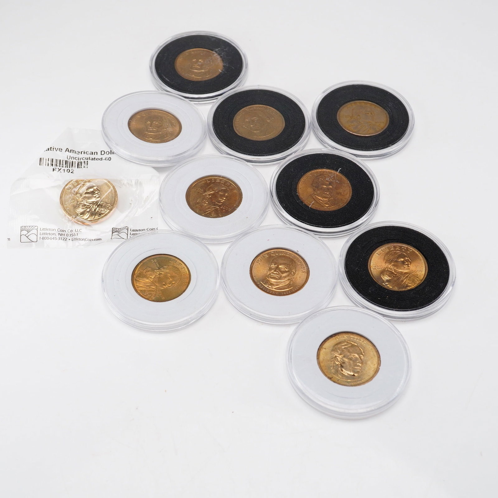 11pc US 1 Dollar Coins including 5 Liberty and 6 Presidential: This collection of eleven US one-dollar coins includes multiple examples from the Sacagawea and Presidential Dollar series. Each coin is composed of a manganese-brass cladding over a copper core, givi