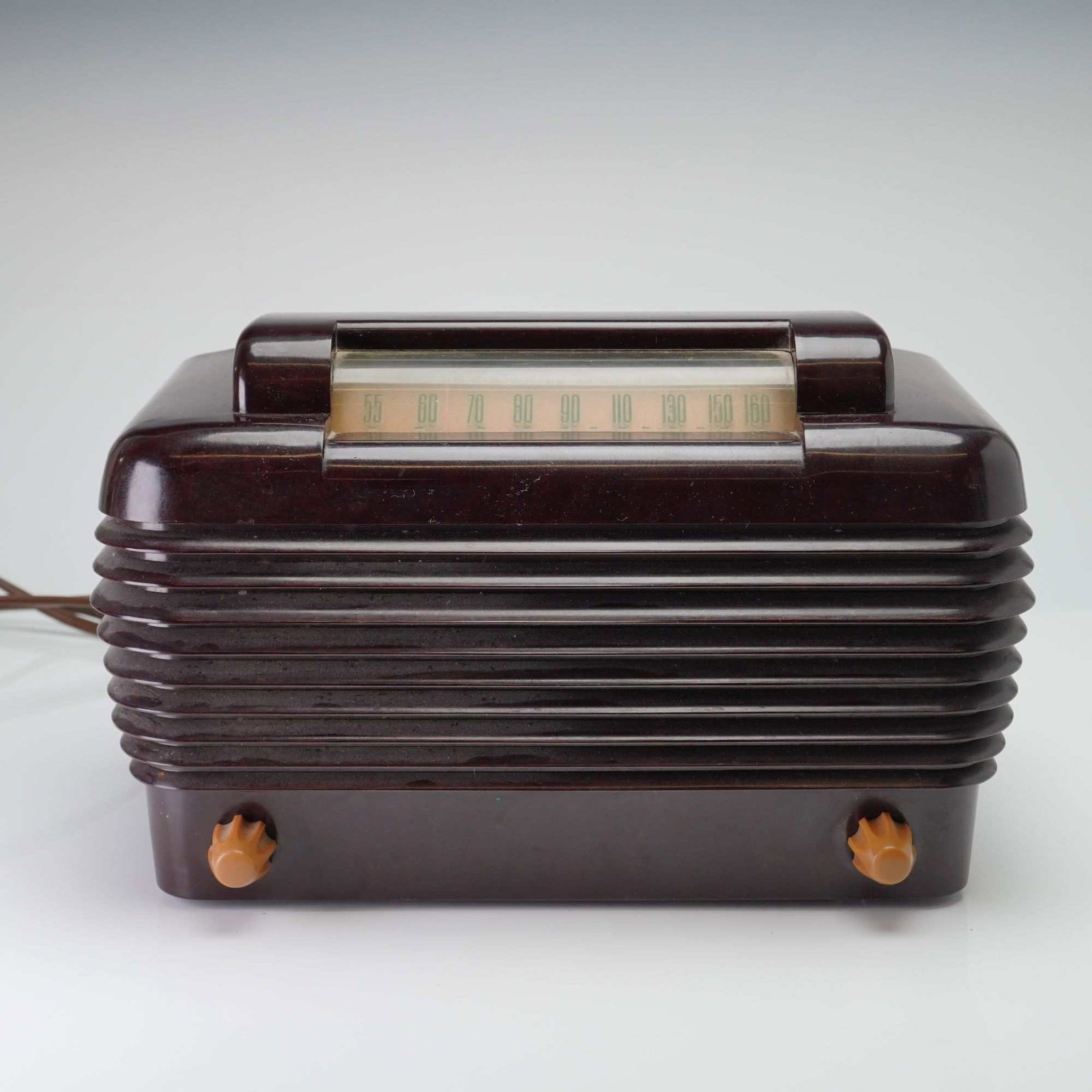 Stromberg-Carlson Model 1101 Dynatomic Bakelite Table Radio: This Stromberg-Carlson Model 1101 Dynatomic table radio was manufactured by the Stromberg-Carlson Telephone Mfg. Co. in Rochester, New York, during the late 1940s. The cabinet is composed of dark brow