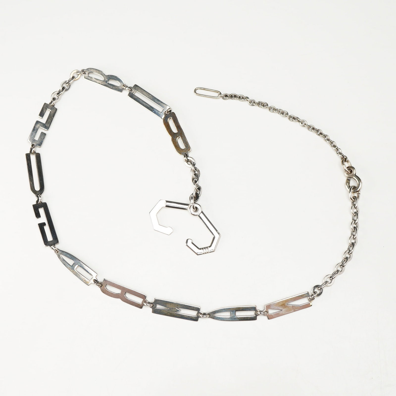Kreisler Quality 925 Sterling Silver Letters and Paperclip Link Chain Necklace: This vintage necklace is produced by Kreisler as part of the Kreisler-QUALITY line. Constructed from 925 sterling silver, the piece features a series of stylized, openwork block letter links that spel