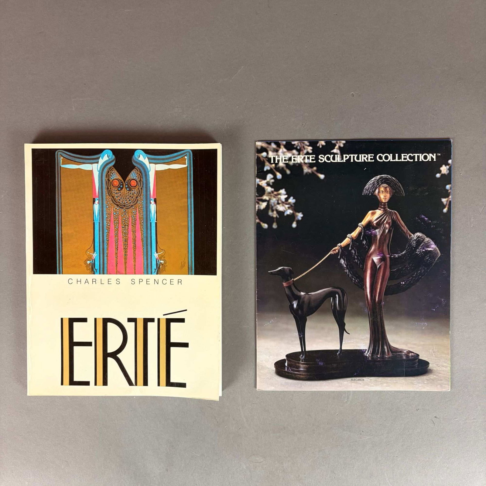 2pc Erte Books, Erte by Charles Spencer and Erte Sculpture Pamphlet: This two-piece collection includes the quarto-sized monograph Erte by Charles Spencer (ISBN: 0-517-543915) and a 1983 Erte Sculpture Collection promotional pamphlet. The book serves as a comprehensive