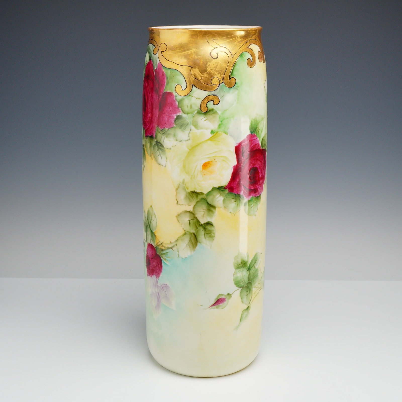 Lenox Belleek Hand-Painted Porcelain Tall Cylinder Vase Signed N. Rhodes: A tall cylindrical porcelain sleeve vase manufactured by the Willets Manufacturing Company of Trenton, New Jersey. The exterior is hand-painted with a naturalistic motif featuring large roses in shade