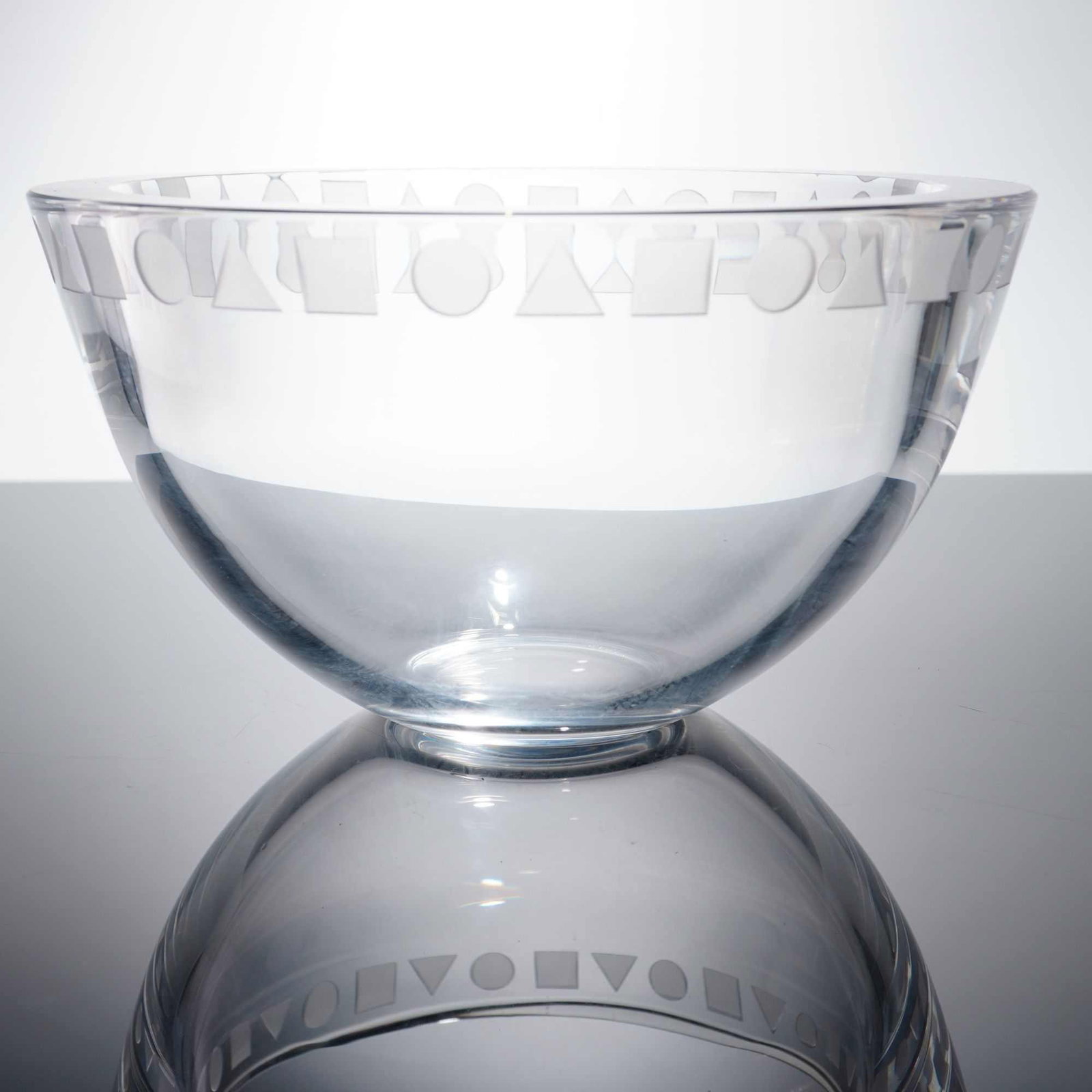 Sasaki Crystal By Ward Bennett Vase with Frosted Geometric Band, Sengai: Crystal vase is crafted from heavy, thick-walled clear glass, reflecting a 1970s modernist aesthetic. The vessel features a wide, acid-etched frosted band encircling the upper portion, decorated with 