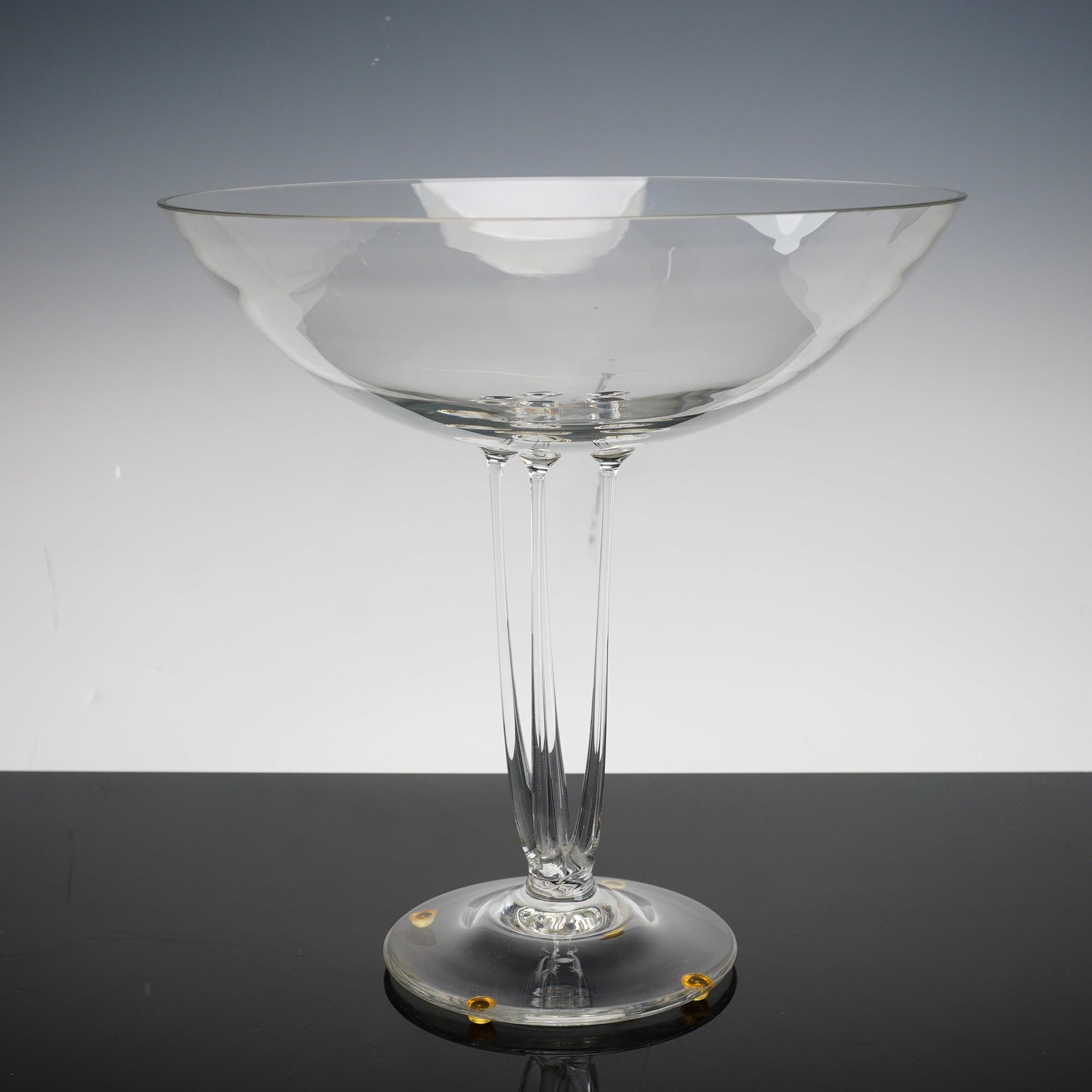 Rosenthal Crystal Pedestal Centerpiece Bowl, Olympus: A Rosenthal crystal pedestal centerpiece bowl of modernist design. The piece features a wide, shallow, unornamented clear glass bowl with a polished rim. The distinctive pedestal stem is constructed f