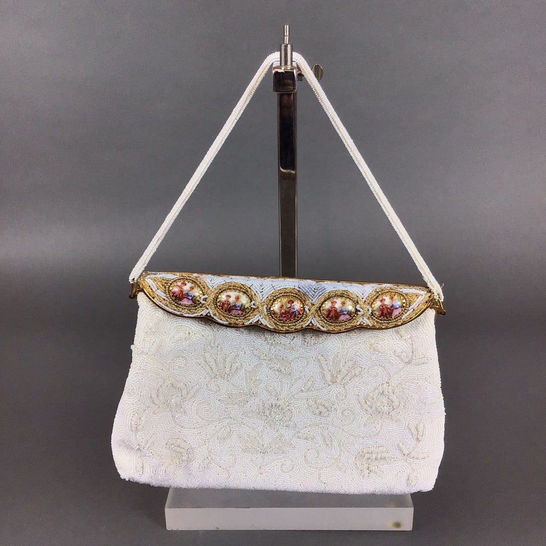 Walborg French Hand Made Micro Beaded Evening Bag with Porcelain Medallions: This Walborg evening bag features hand-applied micro glass seed beads in an off-white color. The exterior is decorated with a raised floral and scrollwork pattern. The gold-tone metal frame includes f