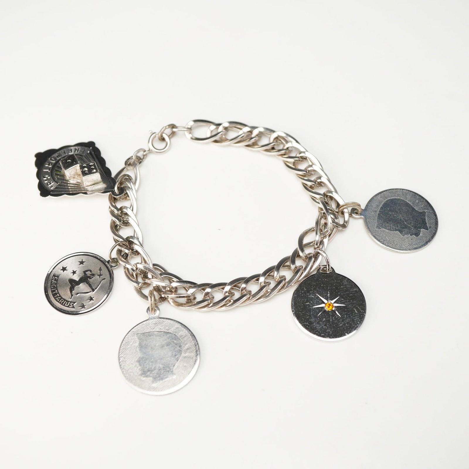 Sterling Silver Curb Link Charm Bracelet with Five Charms (1 of 3)