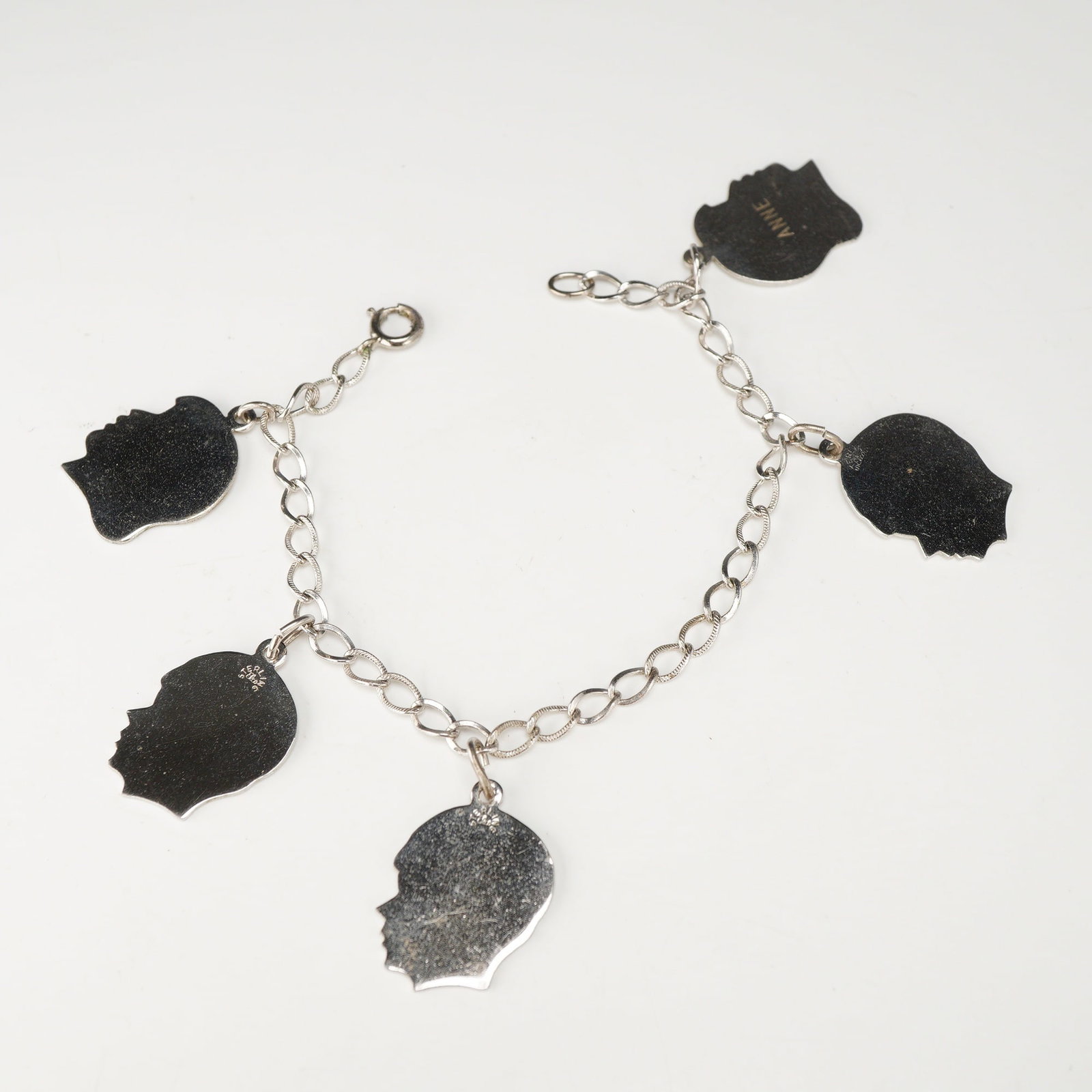Vintage Sterling Silver Mother's Charm Bracelet with Silhouette Charms (1 of 2)