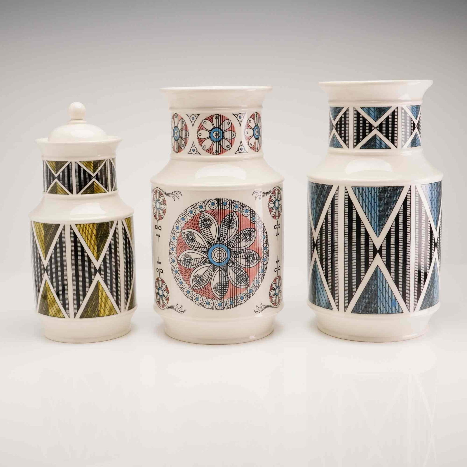 2pc Costume and Souvenir Cuff Bracelets: This lot features two vintage open-back cuff bracelets of different styles and finishes. The first is a silver-tone metal souvenir bracelet featuring a raised repousse scenic design of French landmark