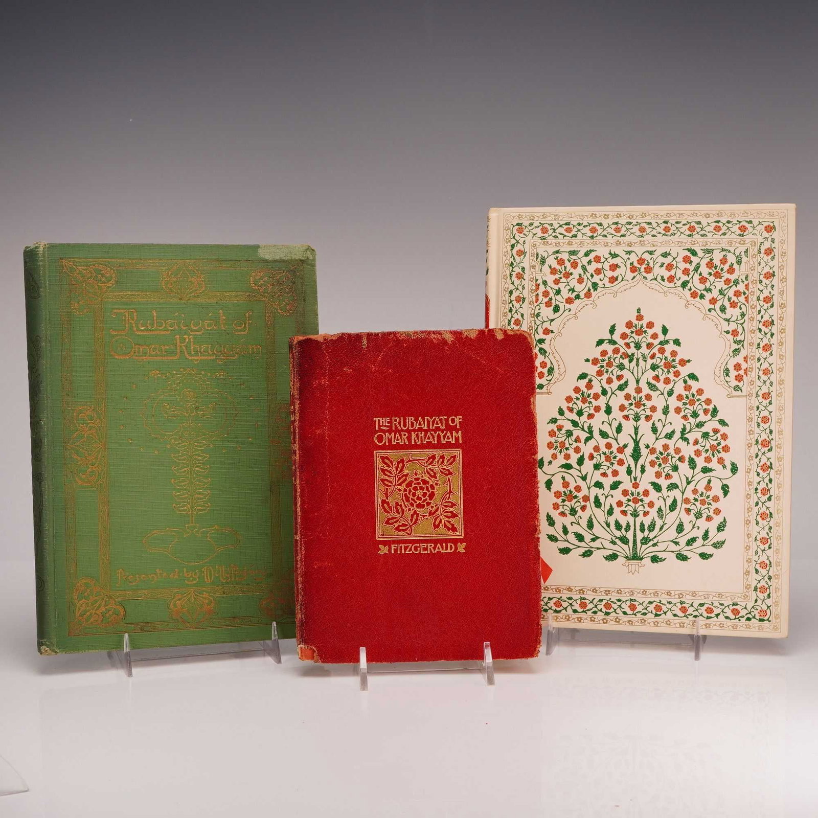 3pc Books The Rubaiyat of Omar Khayyam, Translated by Edward Fitzgerald: This set of three books features the Rubaiyat of Omar Khayyam as translated by Edward Fitzgerald. The collection includes three distinct editions from the mid-20th century. The largest volume is a qua