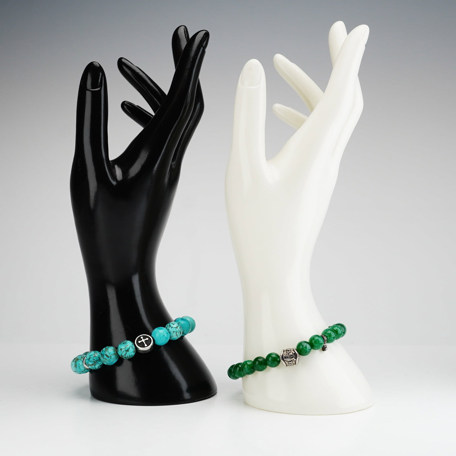 2pc Turquoise and Jade Bead Bracelets: This group features a Marco Cantini bracelet composed of round jade beads, a Buddha head and lotus flowers charms, with an additional charm marked Cantini MC Firenze. The turquoise bead bracelet is ac