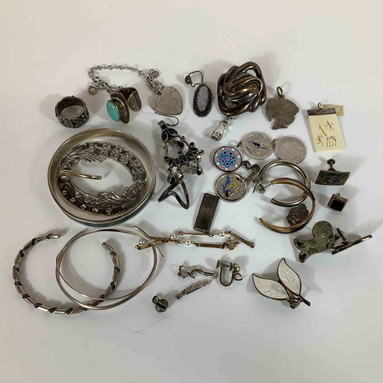 An Assortment of Gold and Sterling Silver Jewelry Including David-Andersen and Danecraft: This collection features an approximately 160g scrap metal lot of gold and sterling silver jewelry. A primary highlight is a pair of David-Andersen sterling silver and yellow enamel double-leaf clip-o