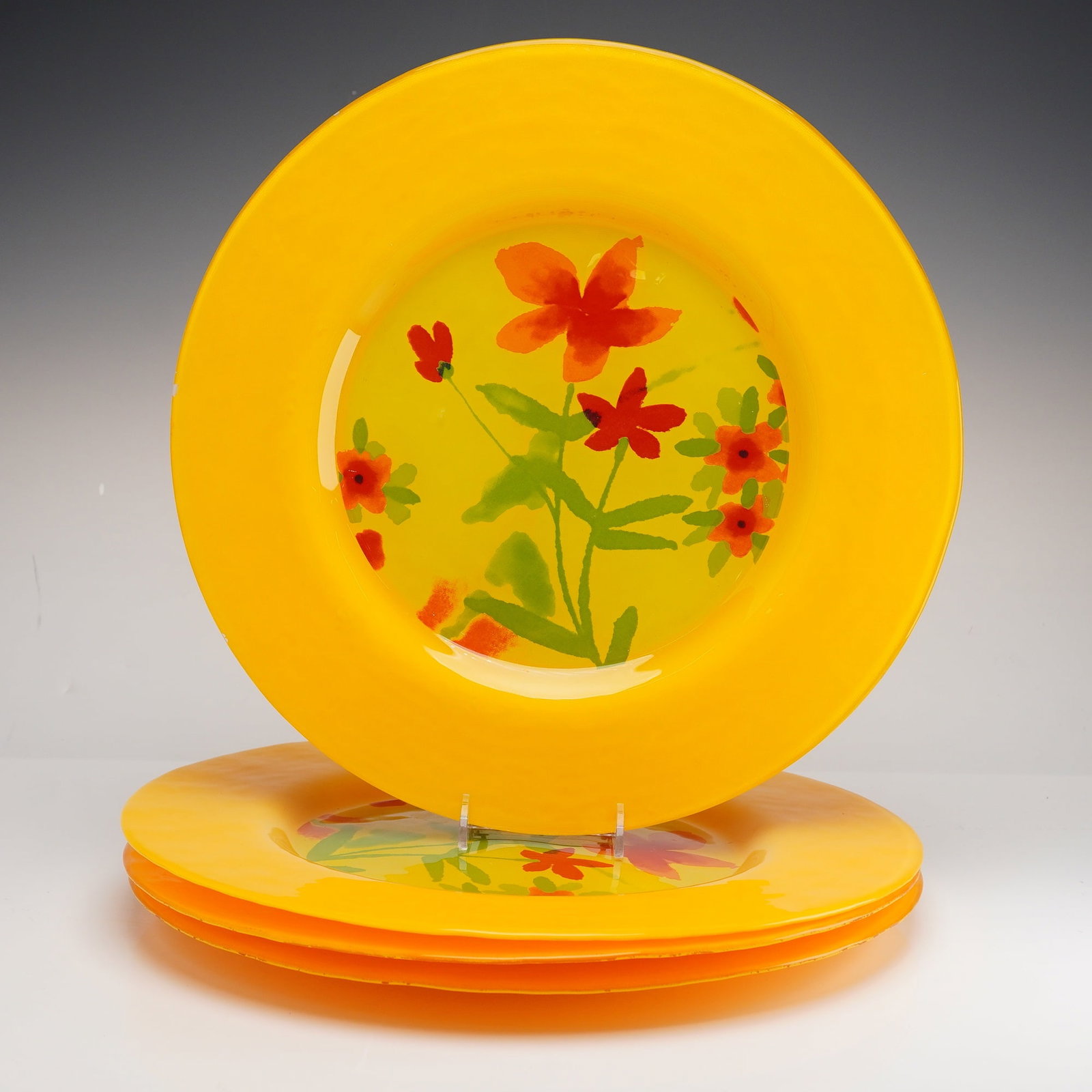 Set of Four Dibbern Germany Yellow Glass Plates, Kristina Pattern: This set of 4 large art glass plates was produced by the German manufacturer Dibbern for Crate and Barrel in the Kristina pattern. Each plate is hand-crafted and mouth-blown, featuring a wide, opaque 