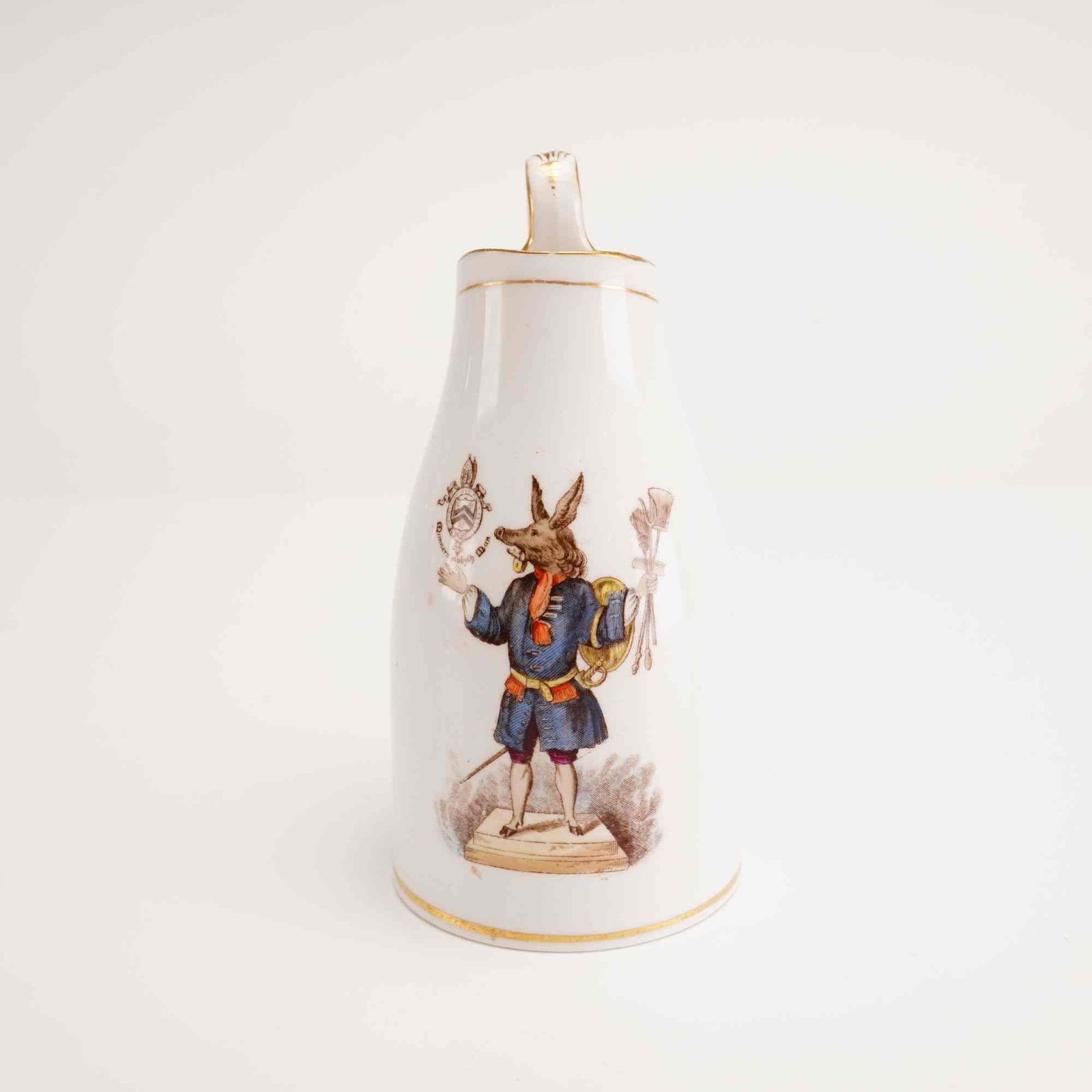 Copeland Porcelain Trusty Servant Jug Published by William Savage of Winchester, circa 1860: This white porcelain commemorative jug features the Trusty Servant of Winchester College. The vessel is of a tall, tapering form with a small pinched spout and a single loop handle decorated with a gi