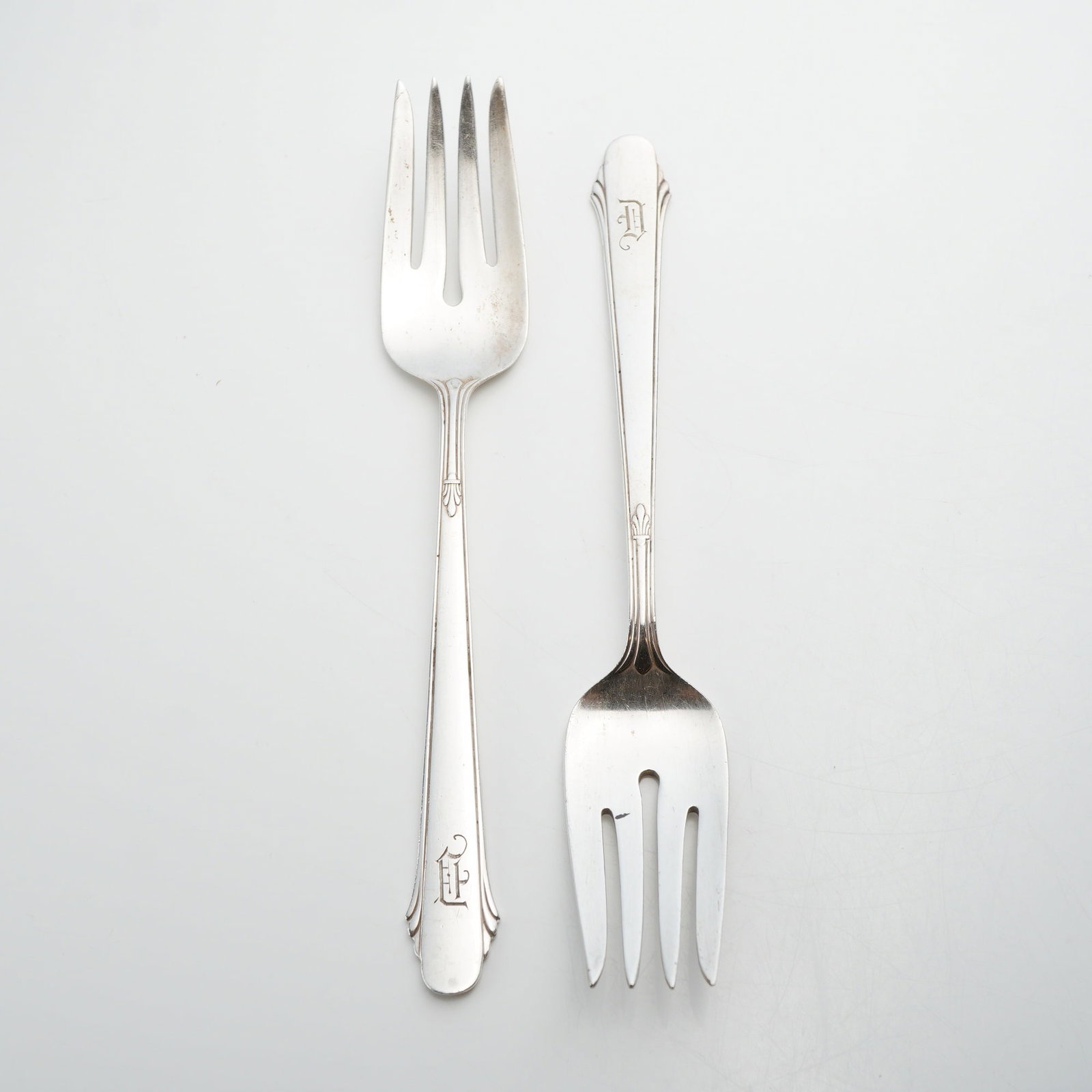 Lot of 2 Gorham Sterling Silver Ice Cream Forks, Hunt Club Pattern: This lot consists of two sterling silver ice cream forks produced by the Gorham Manufacturing Company in the Hunt Club pattern. Introduced in 1930, the design is characteristic of the Art Deco