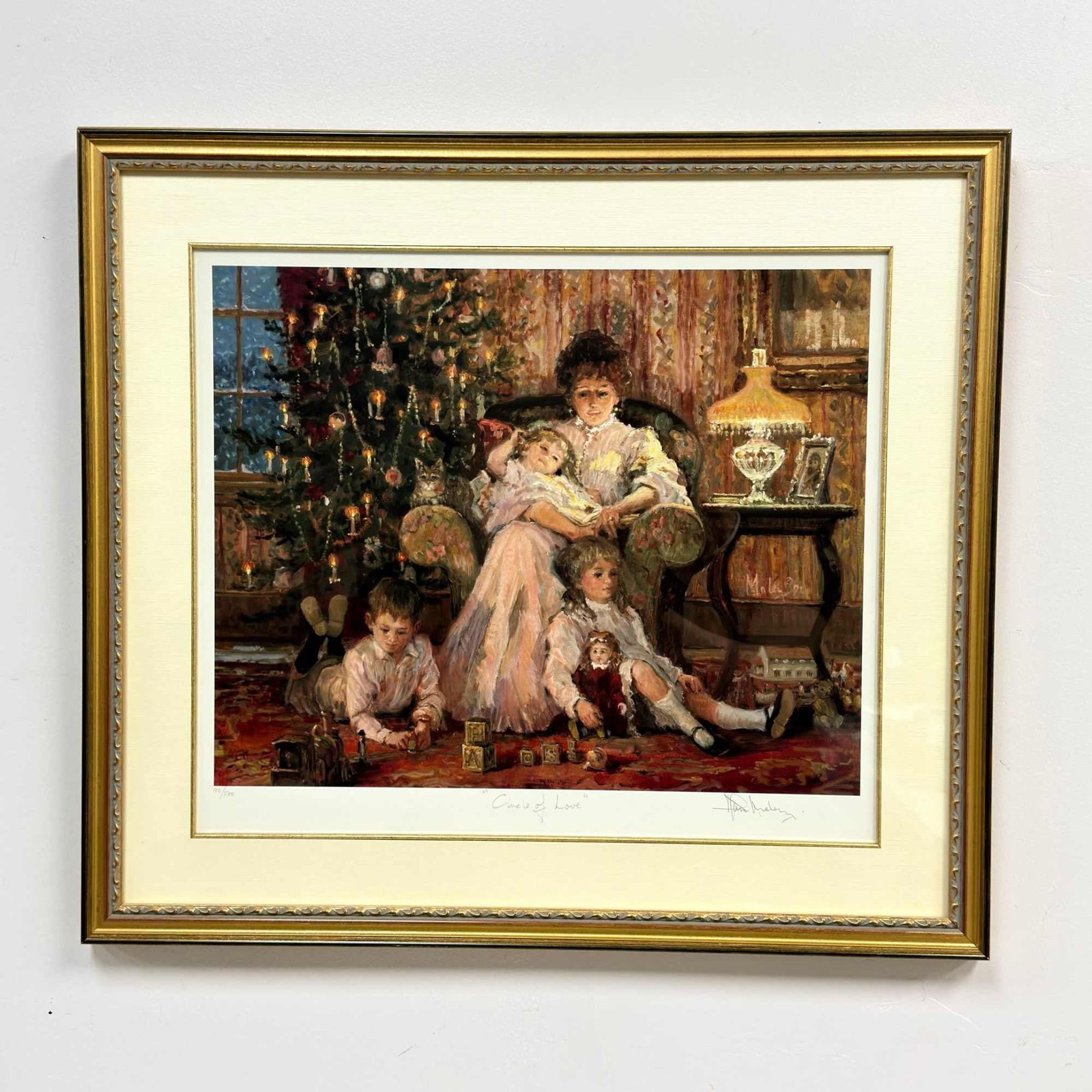 Alan Maley (English, 1931-1995), Limited Edition Lithograph Print, Circle of Love, Signed: This limited edition offset lithograph on paper, titled Circle of Love, is by artist Alan Maley (English, 1931-1995). The artwork depicts a nostalgic Victorian-era indoor scene during the Christmas se